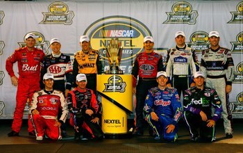 RICHMOND, VA - SEPTEMBER 09:  A group picture of the 10 drivers that made the chase for the Nextel Cup Championship.  (Back Row L-R) Dale Earnhardt Jr., Mark Martin, Matt Kenseth, NASCAR President Mike Helton, Jeff Gordon, Jimmie Johnson, Kevin Harvick, (