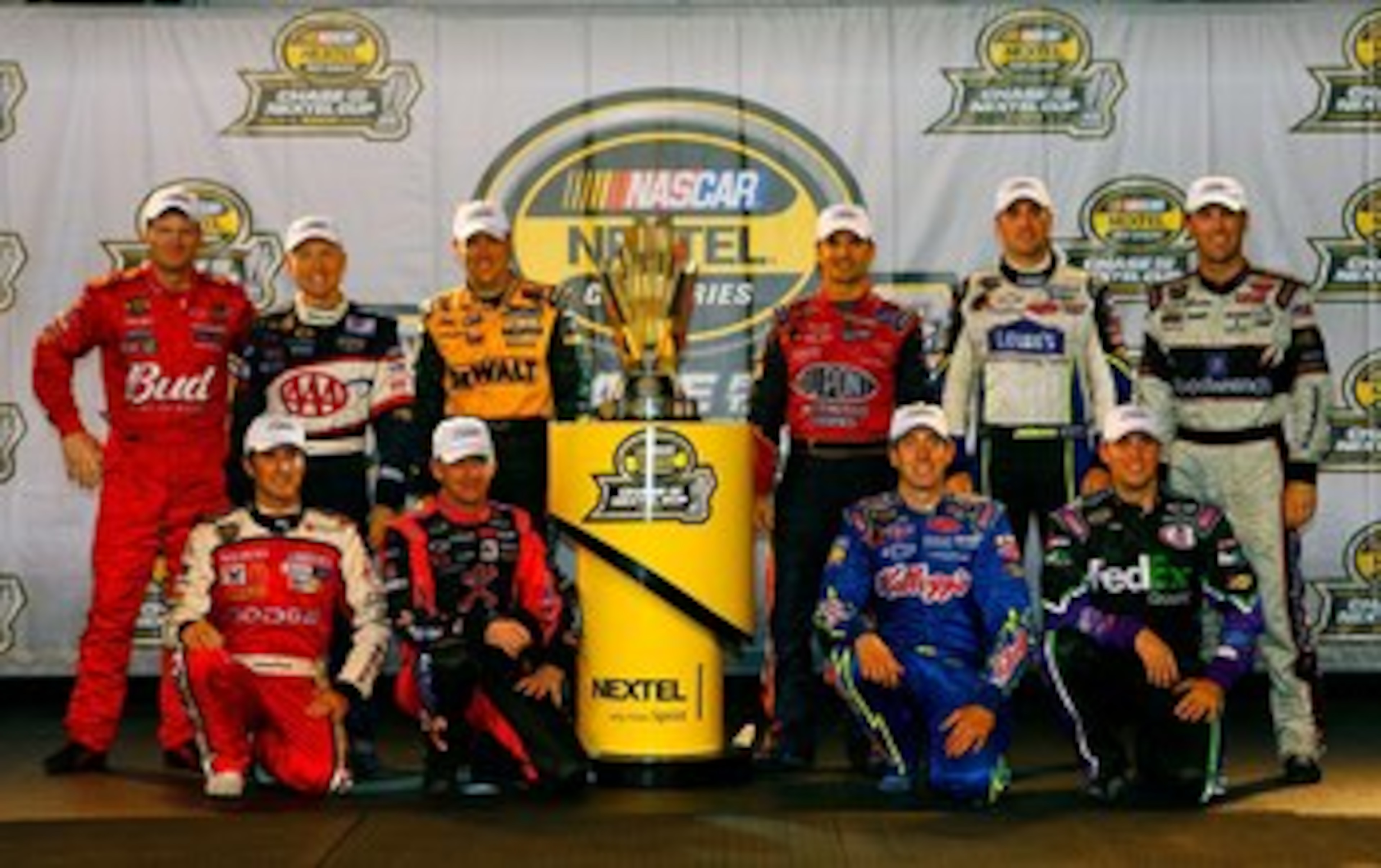 RICHMOND, VA - SEPTEMBER 09: A group picture of the 10 drivers that made the chase for the Nextel Cup Championship. (Back Row L-R) Dale Earnhardt Jr., Mark Martin, Matt Kenseth, NASCAR President Mike Helton, Jeff Gordon, Jimmie Johnson, Kevin Harvick, ( RICHMOND, VA - SEPTEMBER 09: A group picture of the 10 drivers that made the chase for the Nextel Cup Championship. (Back Row L-R) Dale Earnhardt Jr., Mark Martin, Matt Kenseth, NASCAR President Mike Helton, Jeff Gordon, Jimmie Johnson, Kevin Harvick, (