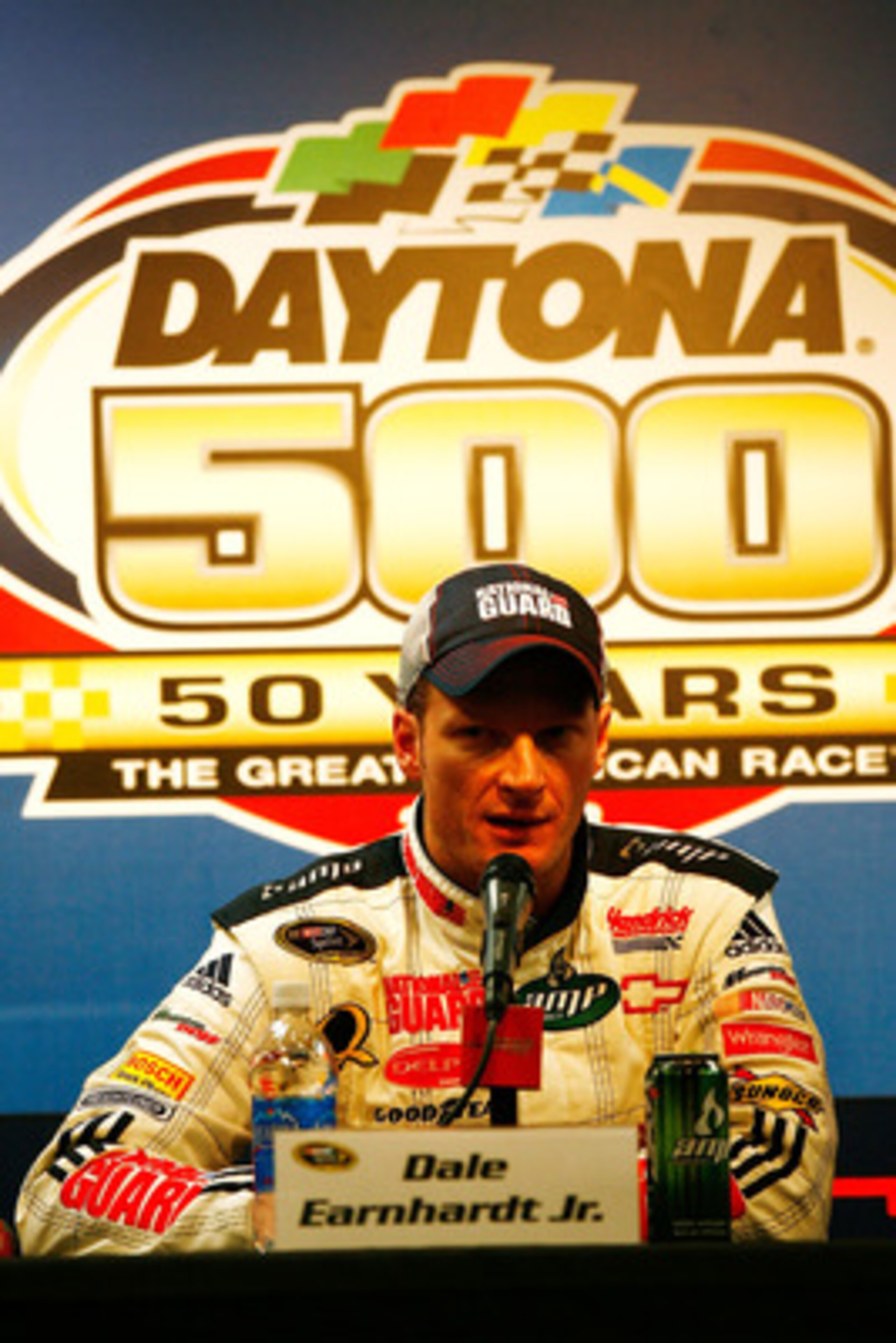 DAYTONA BEACH, FL - FEBRUARY 09: Dale Earnhardt Jr., driver of the #88 Mountian Dew AMP/National Guard Chevrolet, talks to the media during a press conference after winning the Budweiser Shootout at Daytona International Speedway on February 9, 2008 in Da