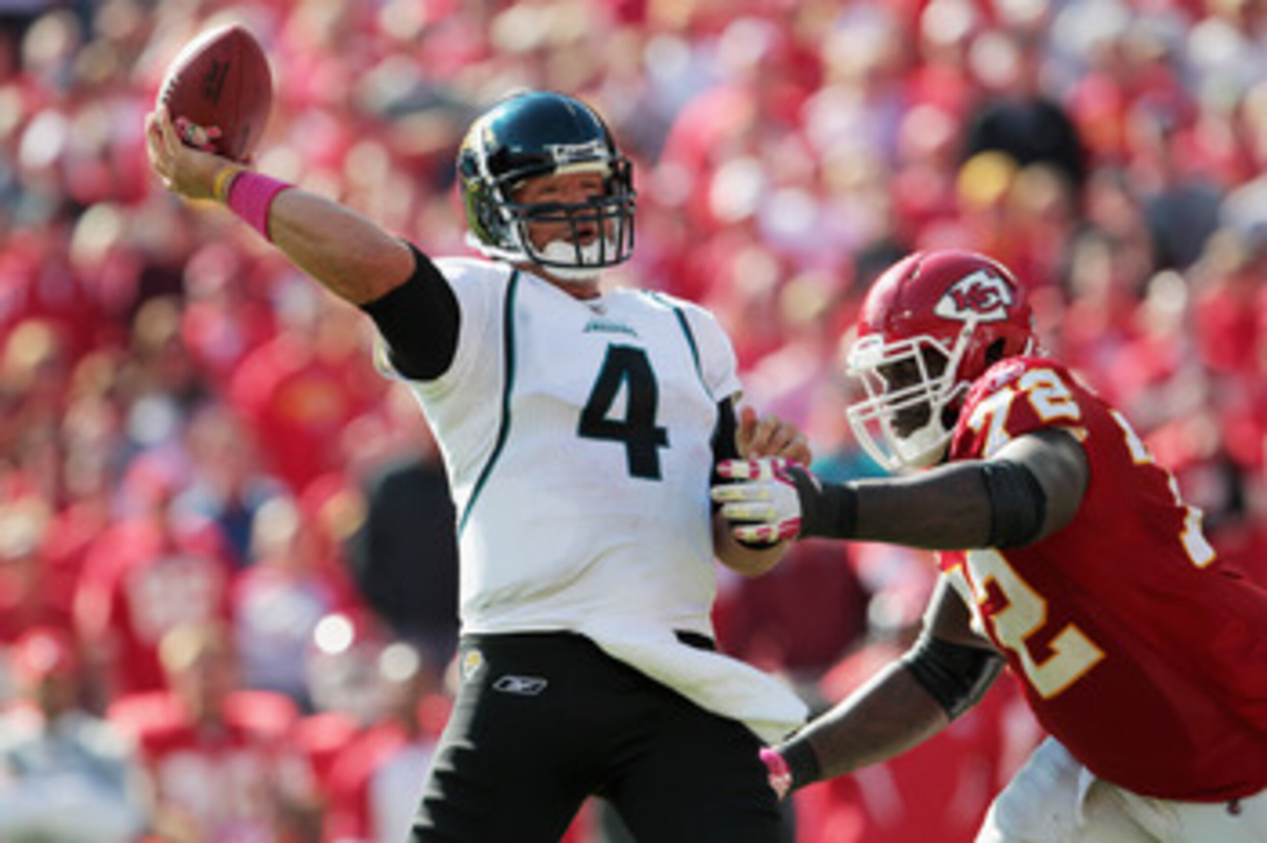 KANSAS CITY, MO - OCTOBER 24:  Quarterback Todd Bouman #4 of the Jacksonville Jaguars passes as Glenn Dorsey #72 of the Kansas City Chiefs defends during the game on October 24, 2010 at Arrowhead Stadium in Kansas City, Missouri.  (Photo by Jamie Squire/G