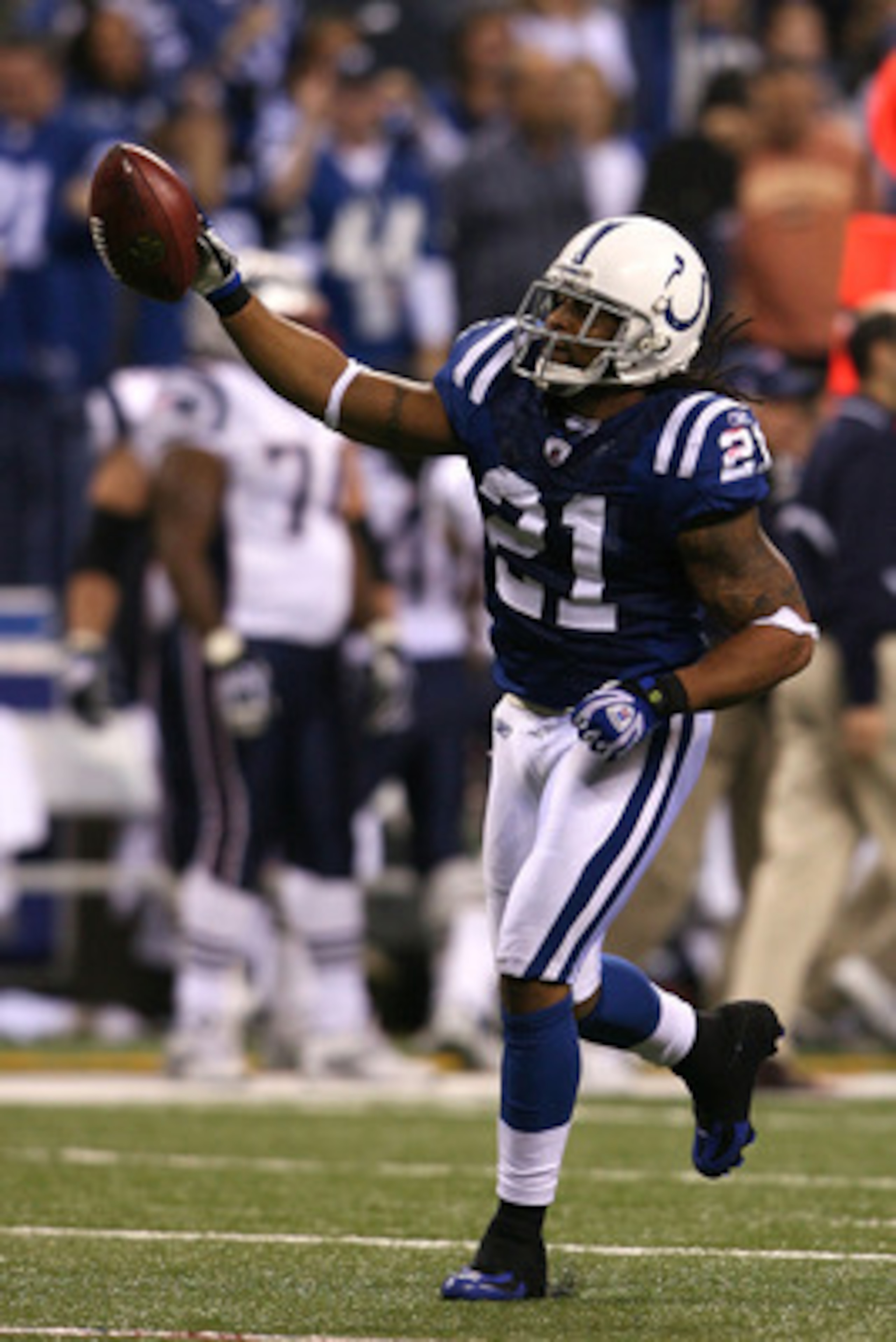 INDIANAPOLIS - NOVEMBER 02:  Bob Sanders #21 of the Indianapolis Colts celebrates after he intercepted  a pass in the fourth quarter against the New England Patriots at Lucas Oil Stadium on November 2, 2008 in Indianapolis, Indiana.  (Photo by Andy Lyons/