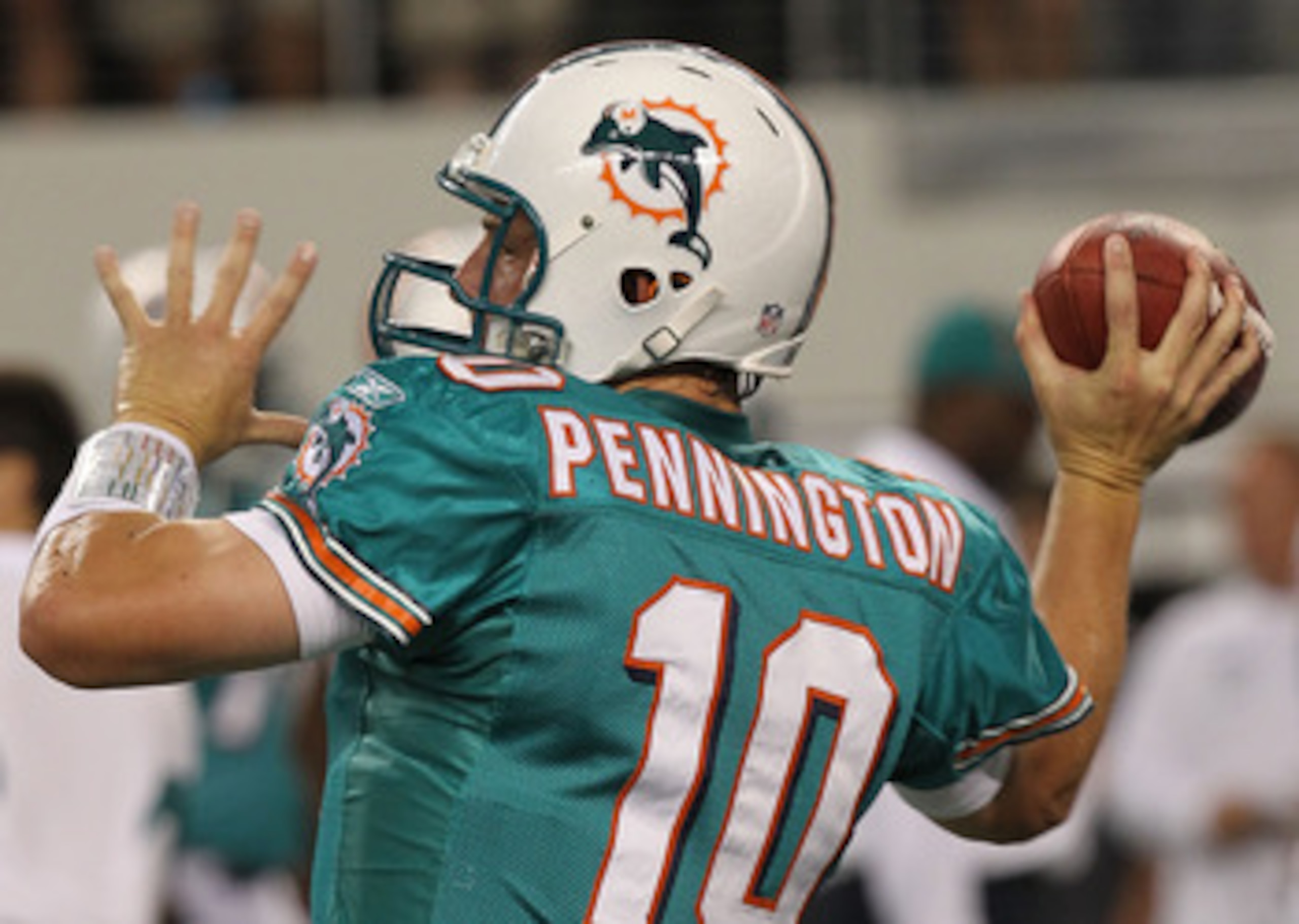 ARLINGTON, TX - SEPTEMBER 02:  Quarterback Chad  Pennington #10 of the Miami Dolphins walks off the field against the Dallas Cowboys during a preseason game at Cowboys Stadium on September 2, 2010 in Arlington, Texas.  (Photo by Ronald Martinez/Getty Imag