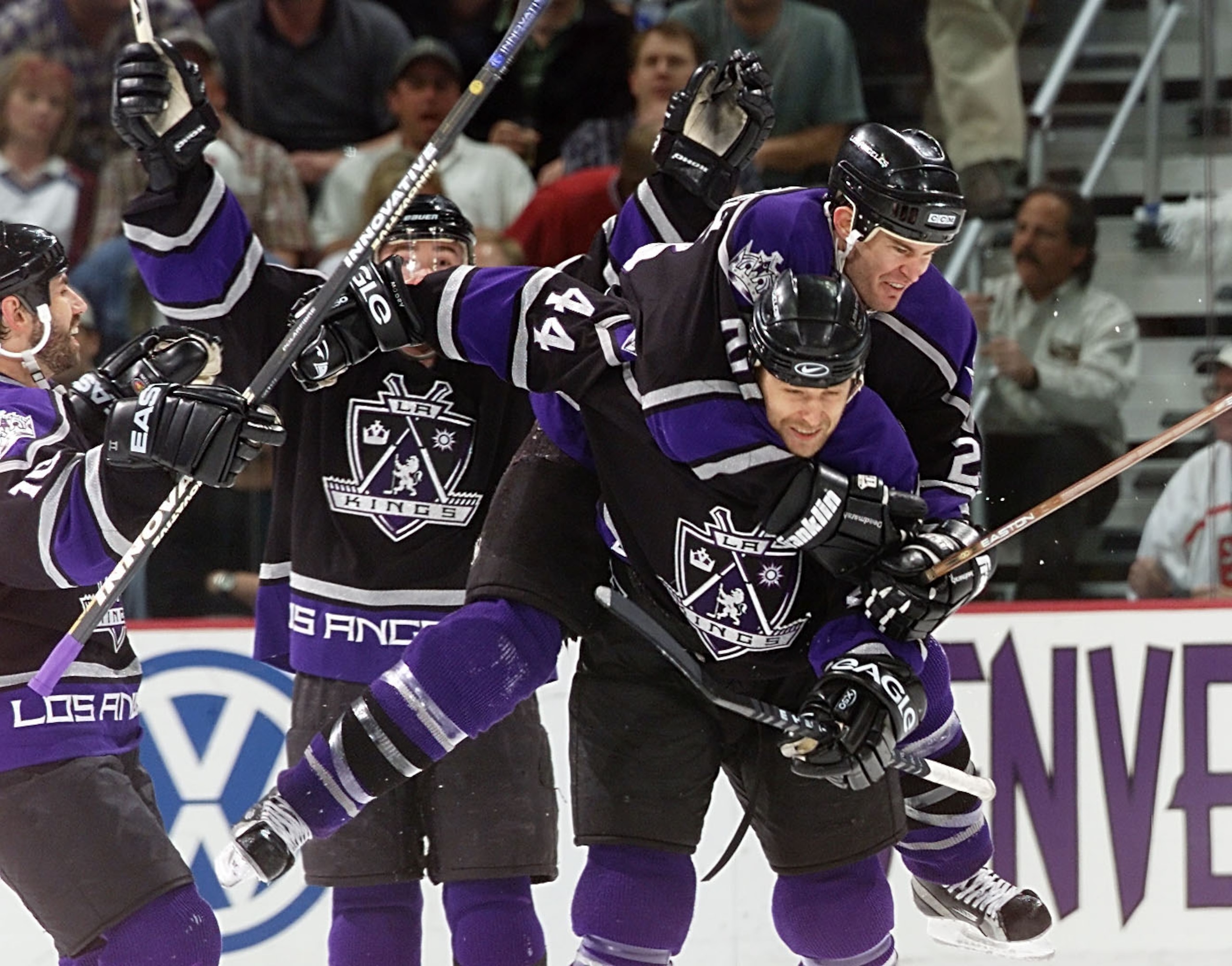 26 Apr 2001:  Adam Deadmarsh #28 of the Los Angeles Kings jumps on the back of Jaroslav Modry #44 after Modry scored the winning goal in overtime against the Colorado Avalanche during Game 1 of the Western Conference semifinals at the Pepsi Center in Denv
