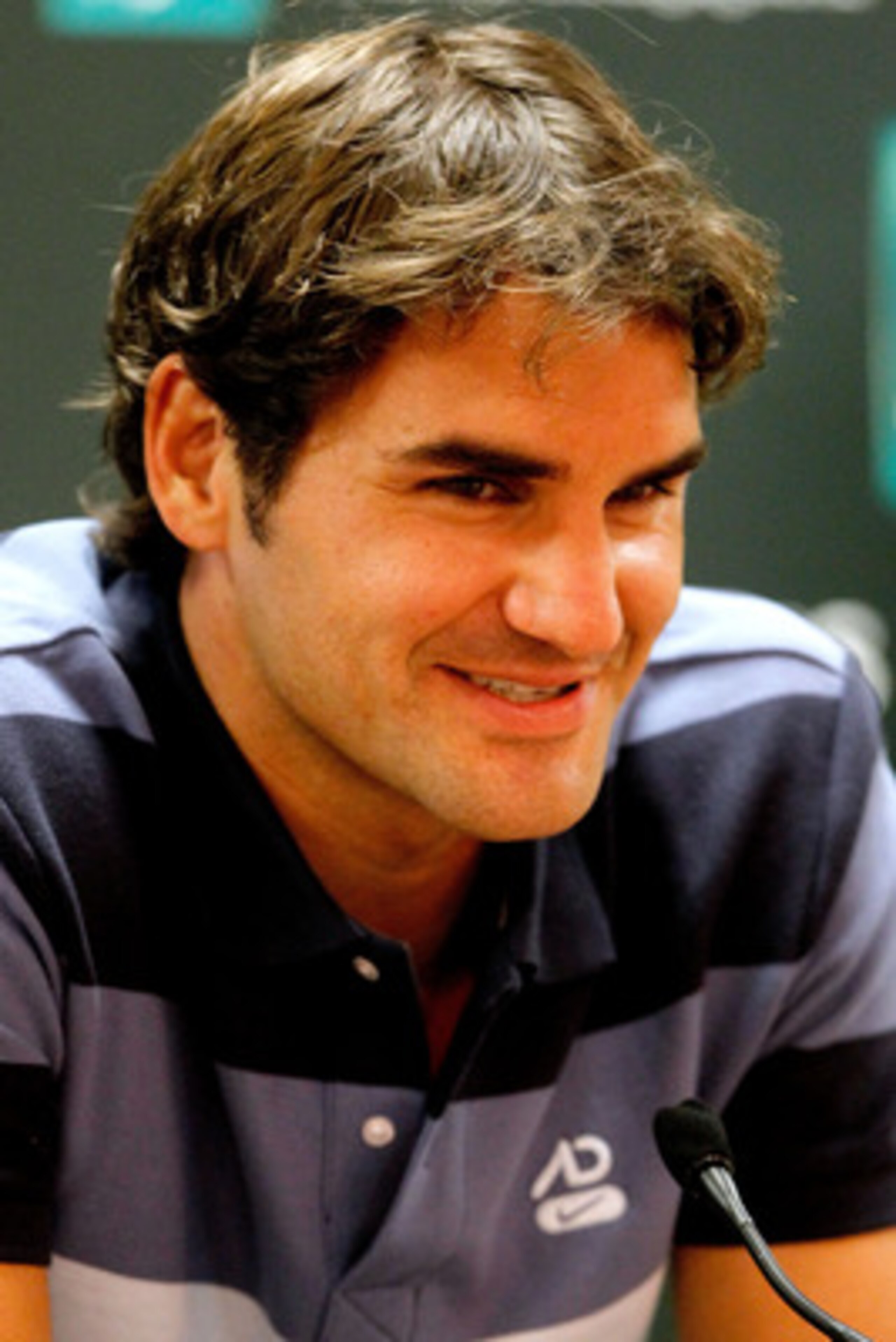 INDIAN WELLS, CA - MARCH 10:  Roger Federer of Switzerland fields questions at a press conference during the BNP Paribas Open at the Indian Wells Tennis Garden on March 10, 2011 in Indian Wells, California.  (Photo by Matthew Stockman/Getty Images)