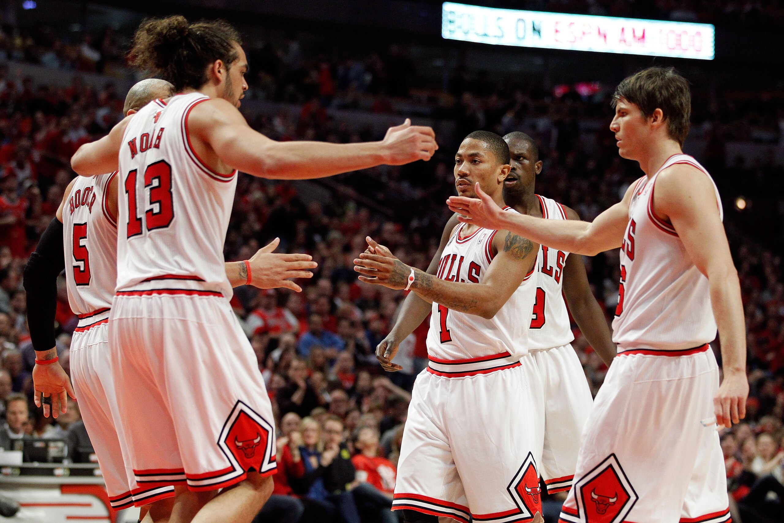 CHICAGO, IL - MAY 15:  (L-R) Carlos Boozer #5, Joakim Noah #13, Derrick Rose #1, Luol Deng #9 and Kyle Korver #23 of the Chicago Bulls huddle up in the first half against the Miami Heat in Game One of the Eastern Conference Finals during the 2011 NBA Play
