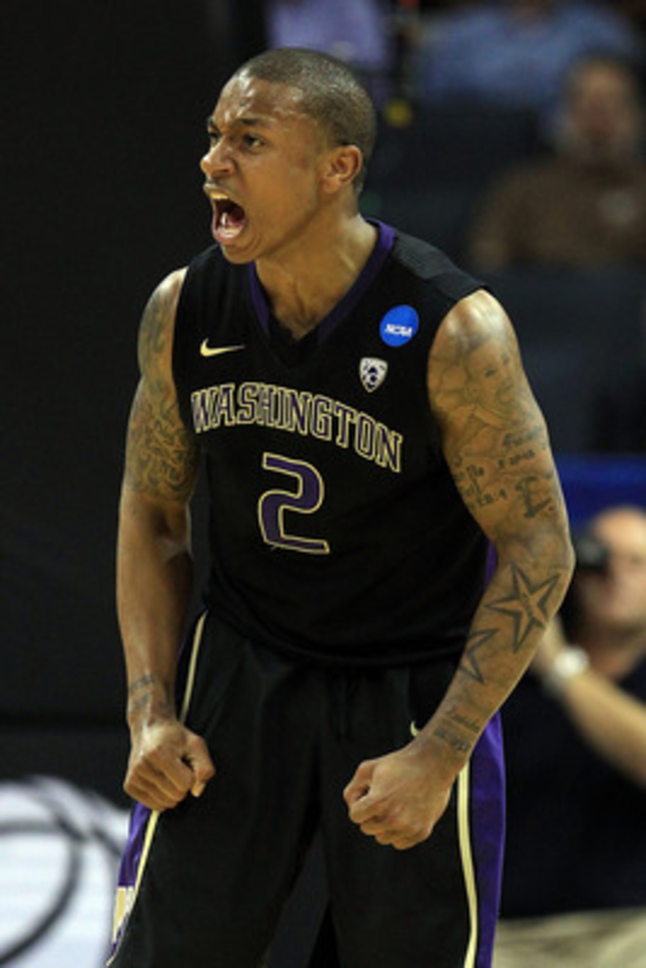 CHARLOTTE, NC - MARCH 20:  Isaiah Thomas #2 of the Washington Huskies reacts in the second half while taking on the North Carolina Tar Heels during the third round of the 2011 NCAA men's basketball tournament at Time Warner Cable Arena on March 20, 2011 i