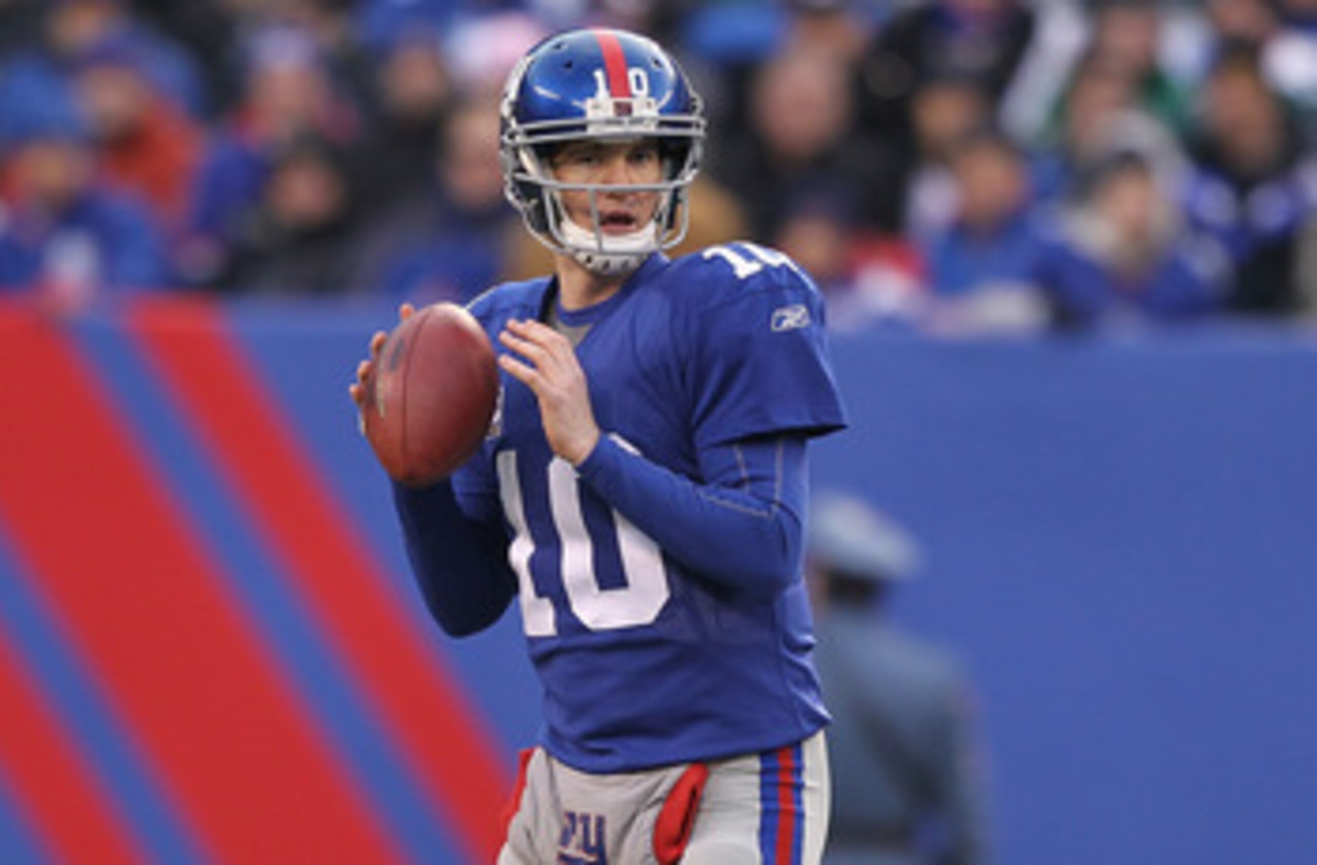 EAST RUTHERFORD, NJ - DECEMBER 19:  Eli Manning #10 of the New York Giants in action against the Philadelphia Eagles 38-31  on December 19, 2010 at The New Meadowlands Stadium in East Rutherford, New Jersey.  (Photo by Al Bello/Getty Images)