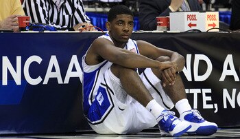 CHARLOTTE, NC - MARCH 20:  Kyrie Irving #1 of the Duke Blue Devils waits to enter the game while taking on the Michigan Wolverines during the third round of the 2011 NCAA men's basketball tournament at Time Warner Cable Arena on March 20, 2011 in Charlott