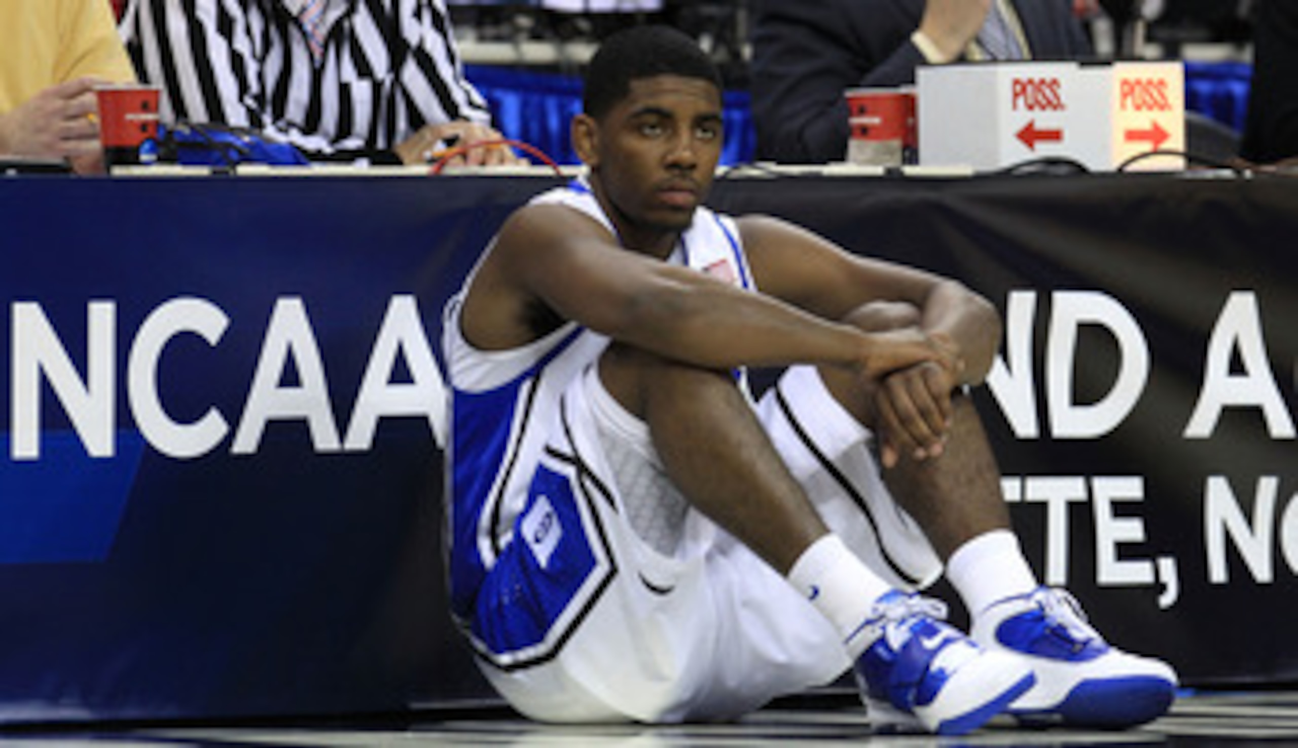 CHARLOTTE, NC - MARCH 20:  Kyrie Irving #1 of the Duke Blue Devils waits to enter the game while taking on the Michigan Wolverines during the third round of the 2011 NCAA men's basketball tournament at Time Warner Cable Arena on March 20, 2011 in Charlott