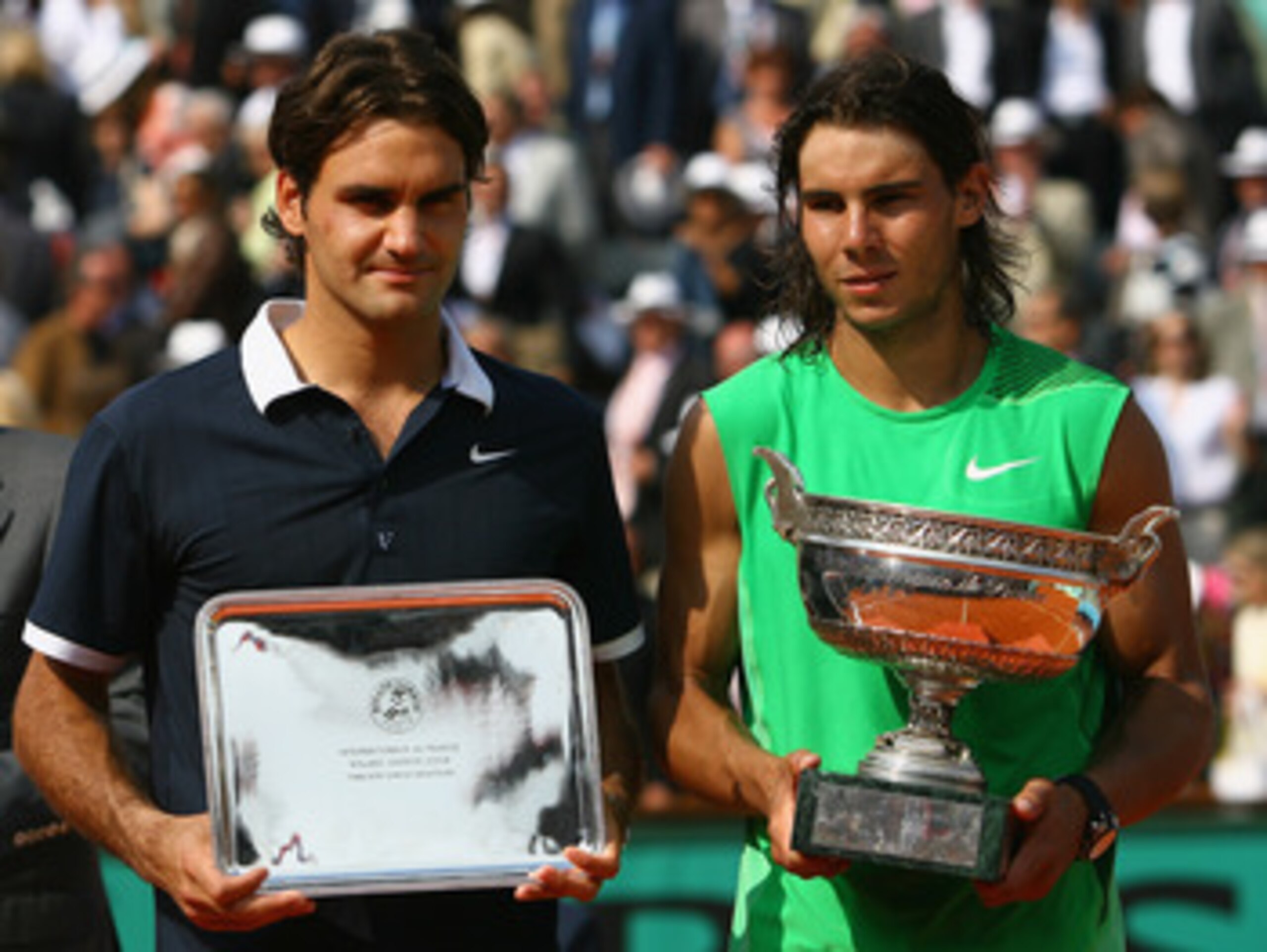 PARIS - JUNE 08:  Roger Federer (L) of Switzerland and Rafael Nadal of Spain with their trophies after the Men's Singles Final match on day fifteen of the French Open at Roland Garros on June 8, 2008 in Paris, France.  (Photo by Julian Finney/Getty Images