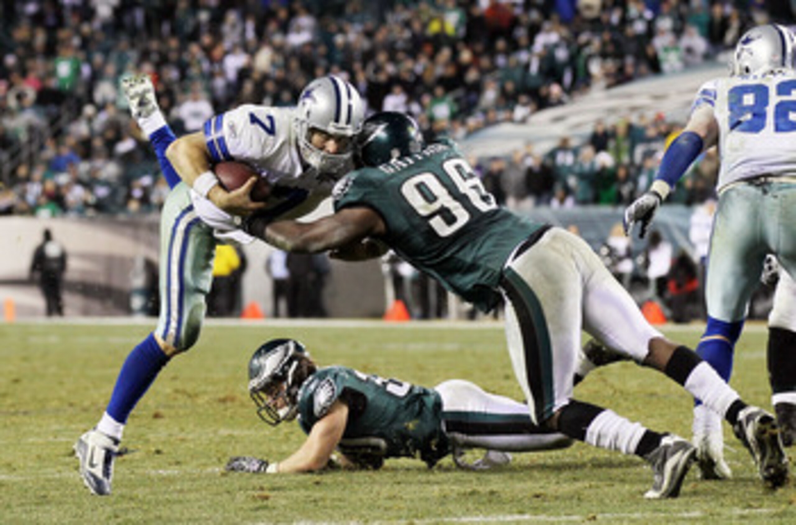 PHILADELPHIA, PA - JANUARY 02:  Stephen McGee #7 of the Dallas Cowboys runs the ball against Omar Gaither #96 of the Philadelphia Eagles on January 2, 2011 at Lincoln Financial Field in Philadelphia, Pennsylvania. The Cowboys defeated the Eagles 14-13.  (