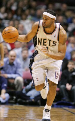 EAST RUTHERFORD, NJ - FEBRUARY 5:  Ron Mercer #1 of the New Jersey Nets advances the ball upcourt during the game against the Philadelphia Sixers on February 7, 2005 at Continental Airlines Arena in East Rutherford, New Jersey.  NOTE TO USER:  User expres