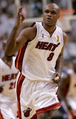 MIAMI - JUNE 15:  Antoine Walker #8 of the Miami Heat celebrates a three-point basket in the fourth quarter against the Dallas Mavericks in game four of the 2006 NBA Finals on June 15, 2006 at American Airlines Arena in Miami, Florida.  NOTE TO USER: User
