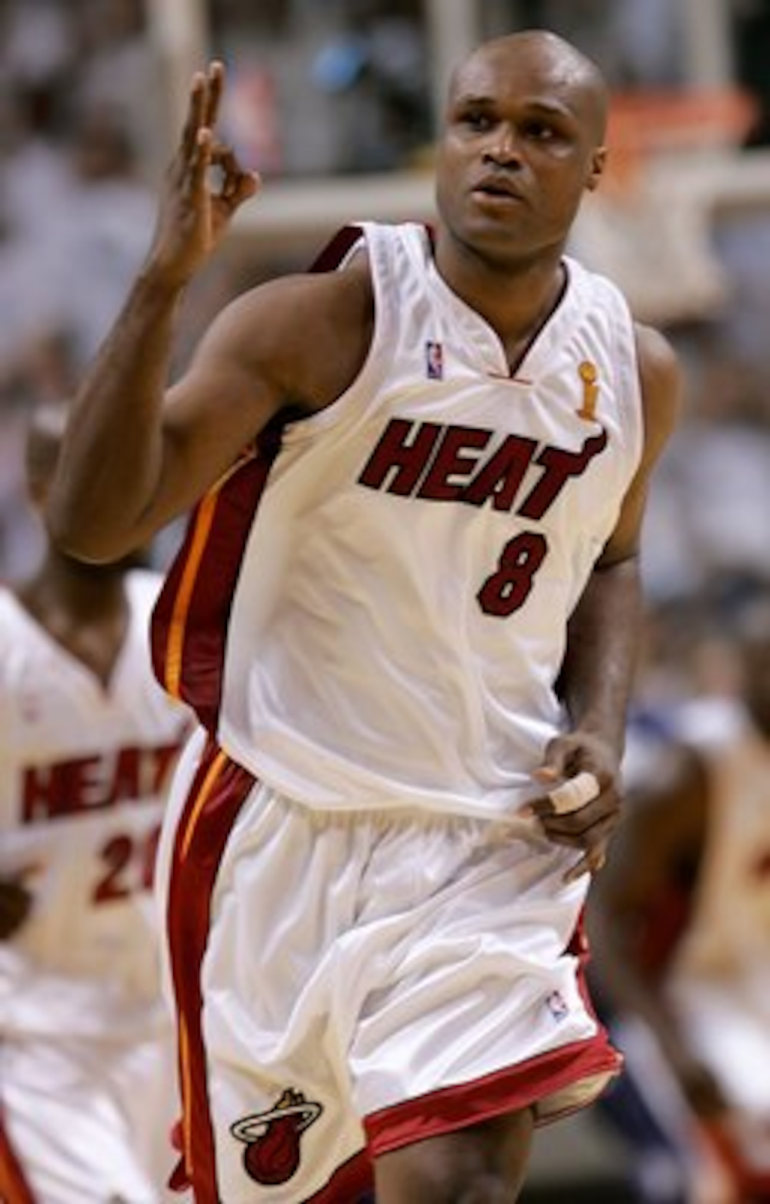 MIAMI - JUNE 15:  Antoine Walker #8 of the Miami Heat celebrates a three-point basket in the fourth quarter against the Dallas Mavericks in game four of the 2006 NBA Finals on June 15, 2006 at American Airlines Arena in Miami, Florida.  NOTE TO USER: User