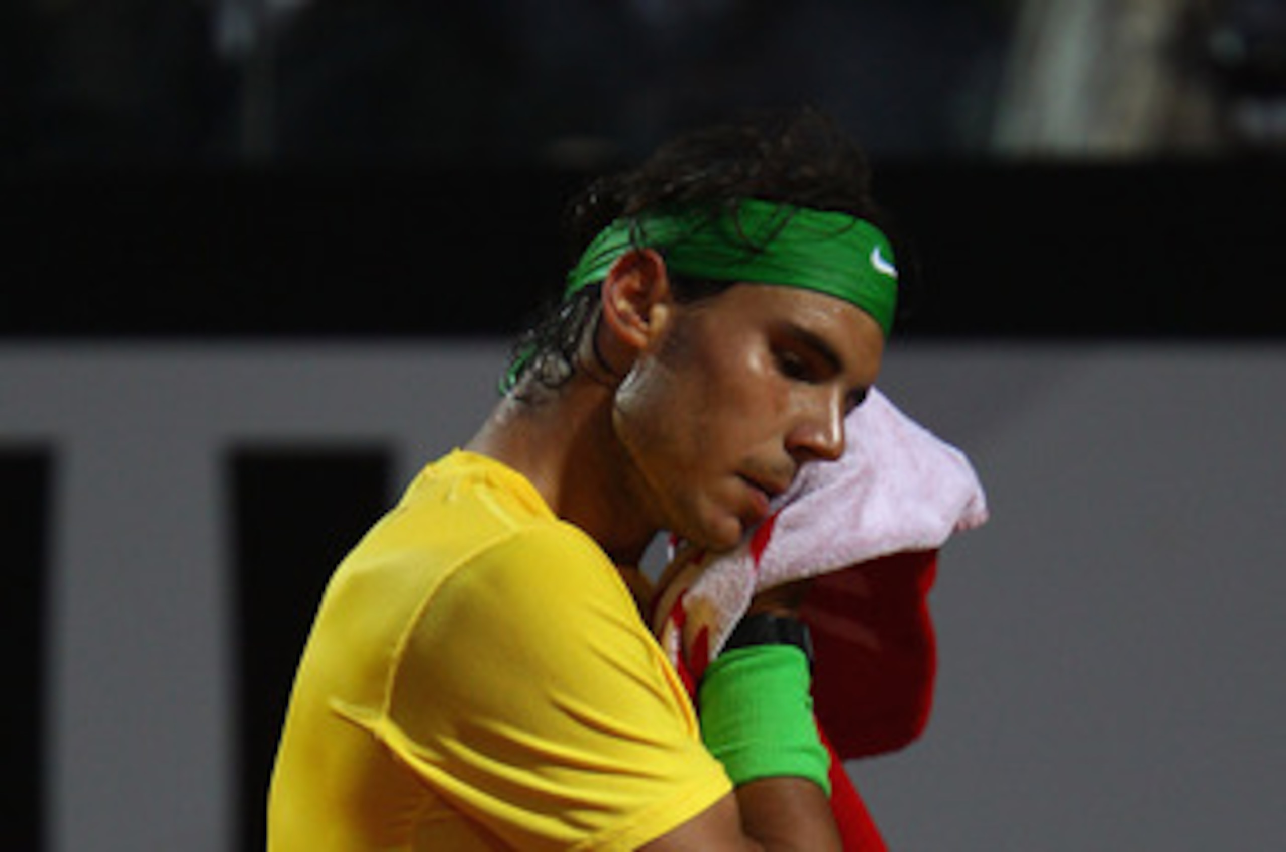 ROME, ITALY - MAY 15:  Rafael Nadal of Spain shows his dejection during the final against Novak Djokovic of Serbia during day eight of the Internazoinali BNL D'Italia at the Foro Italico Tennis Centre on May 15, 2011 in Rome, Italy.  (Photo by Clive Bruns
