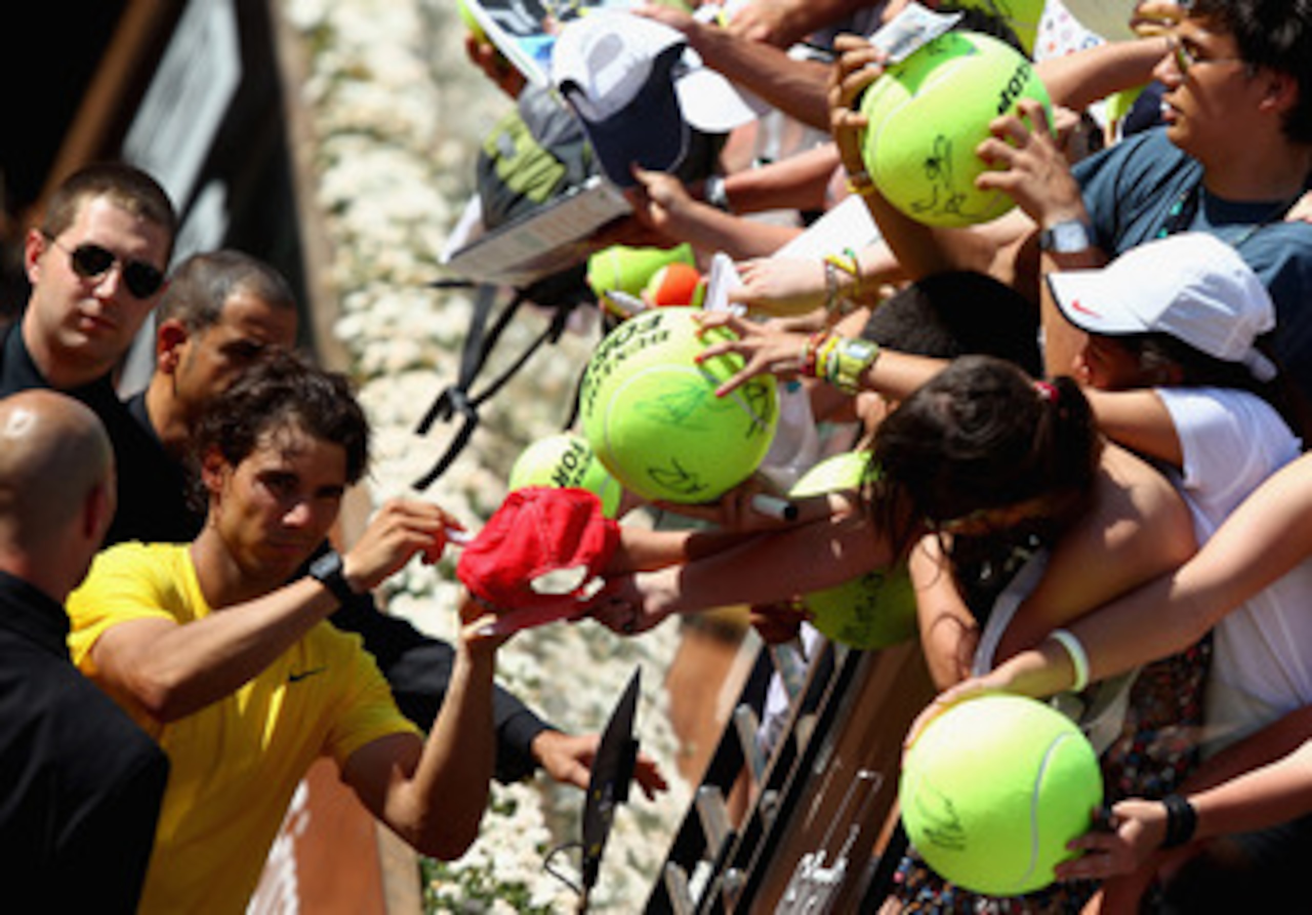 ROME, ITALY - MAY 11:  Rafael Nadal of Spain signs autographs after his second round match against Paolo Lorenzi of Italy during day four of the Internazoinali BNL D'Italia at the Foro Italico Tennis Centre on May 11, 2011 in Rome, Italy.  (Photo by Clive