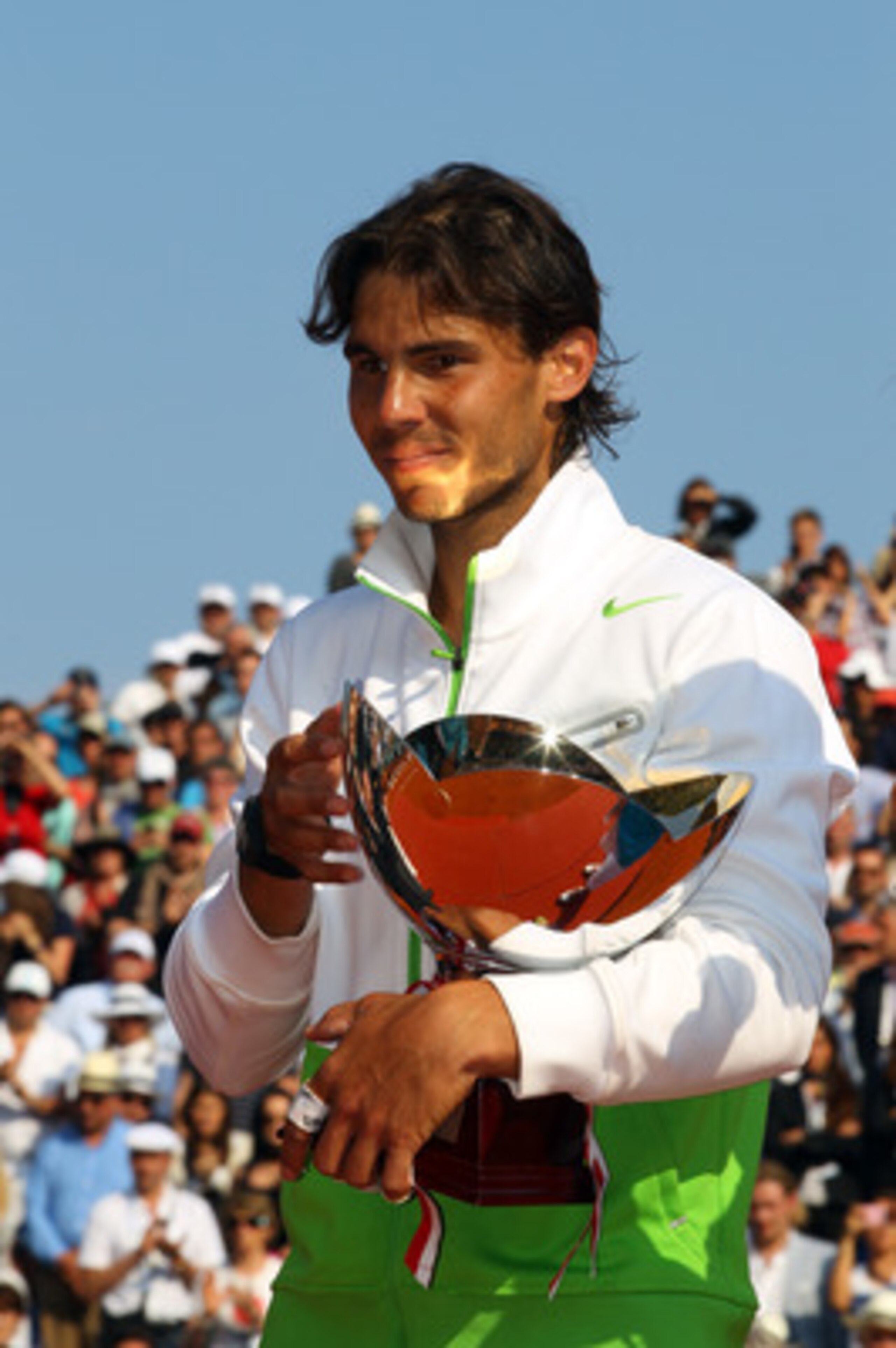 MONACO - APRIL 17:  Rafael Nadal of Spain with the trophy after defeating David Ferrer of Spain in the final during Day Eight of the ATP Masters Series Tennis at the Monte Carlo Country Club on April 17, 2011 in Monte Carlo, Monaco.  (Photo by Julian Finn