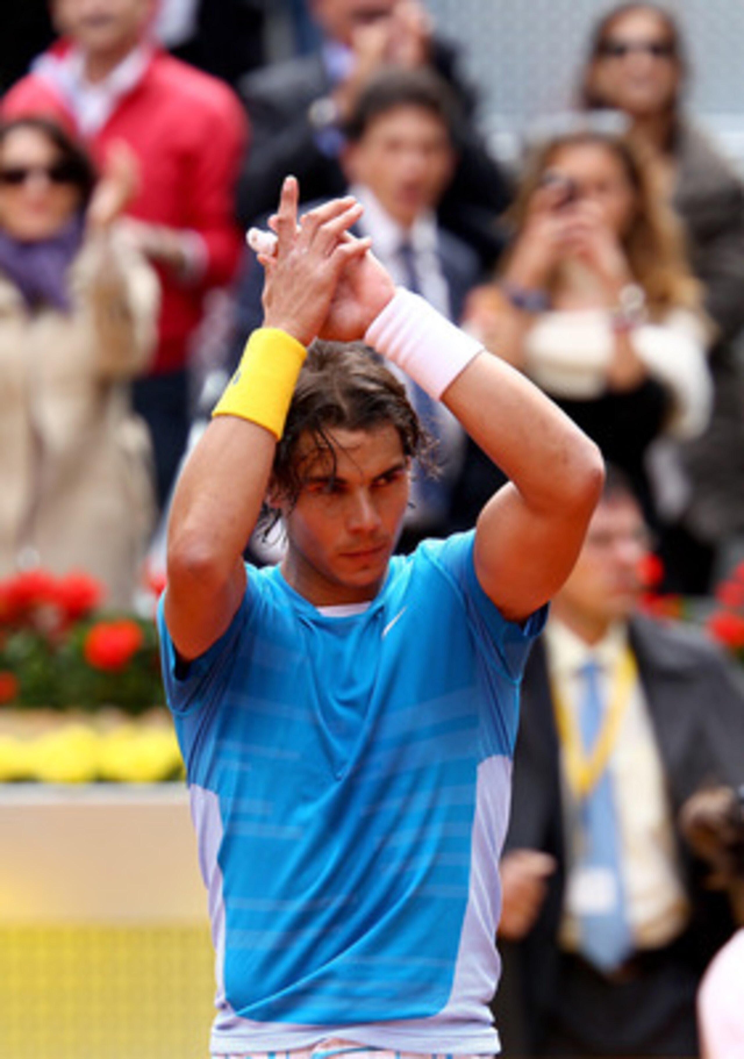 MADRID, SPAIN - MAY 14:  Rafael Nadal of Spain applauds the crowd after his straight sets victory against Gael Monfils of France in their quarter final match during the Mutua Madrilena Madrid Open tennis tournament at the Caja Magica on May 14, 2010 in Ma