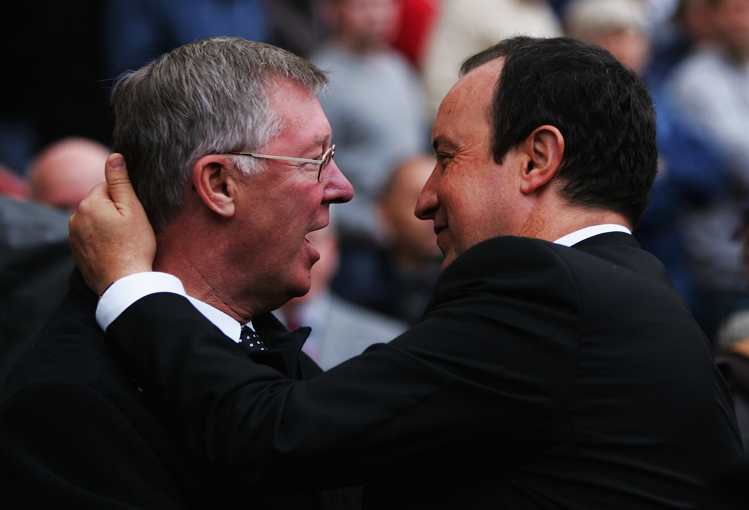 MANCHESTER, UNITED KINGDOM - OCTOBER 22: Liverpool Manager Rafael Benitez (R) embraces Manchester United Manager Sir Alex Ferguson prior to the start of the Barclays Premiership match between Manchester United and Liverpool at Old Trafford on October 22,