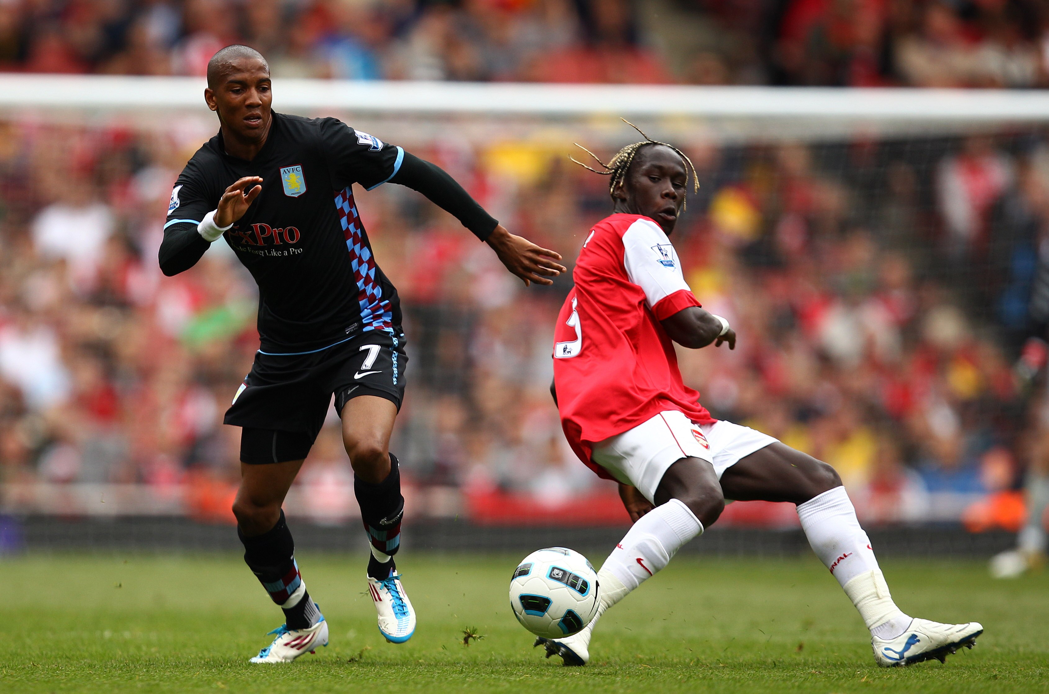 LONDON, ENGLAND - MAY 15:  Bacary Sagna (R) of Arsenal in action against Ashley Young of Aston Villa during the Barclays Premier League match between Arsenal and Aston Villa at the Emirates Stadium on May 15, 2011 in London, England.  (Photo by Richard He