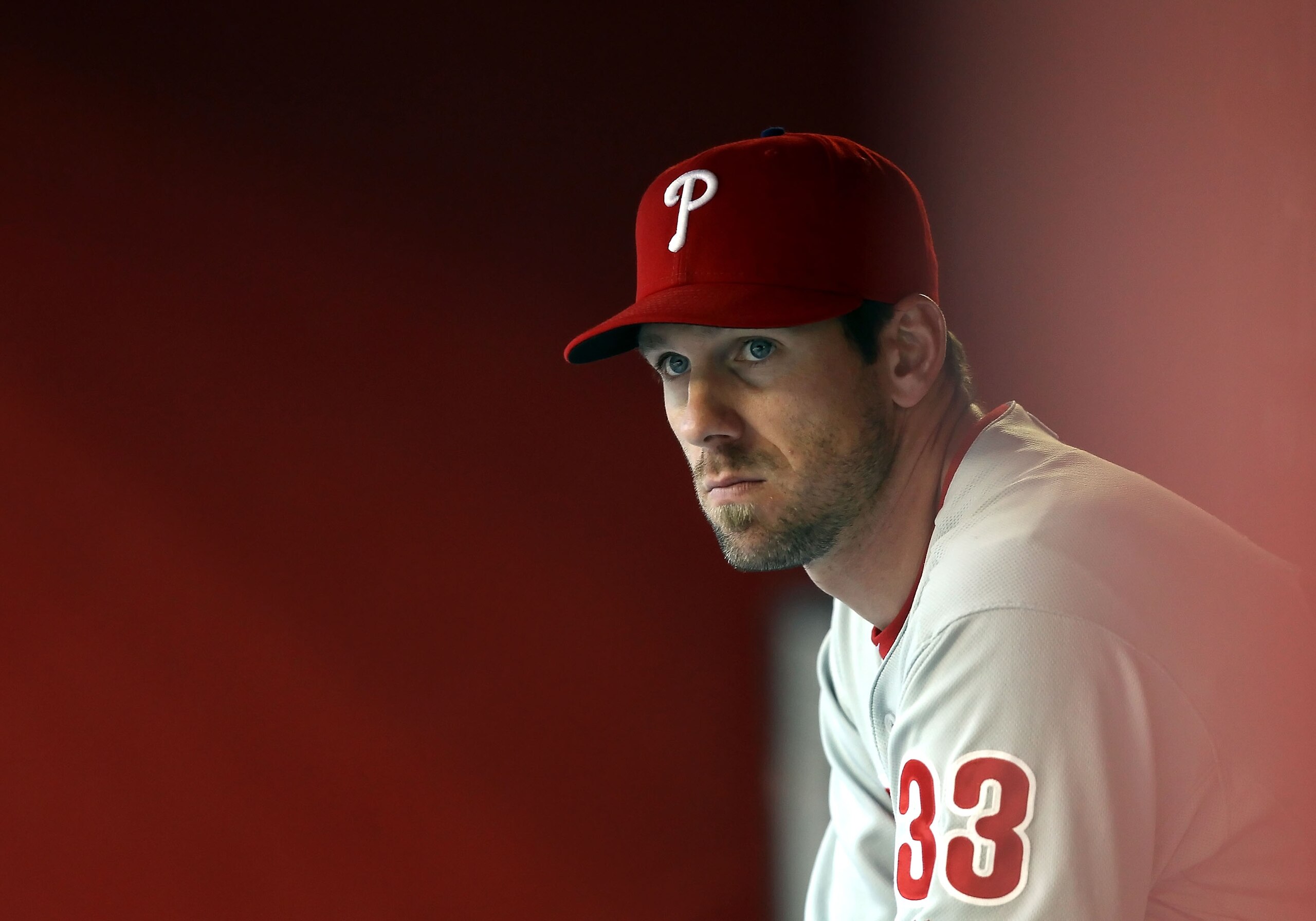 PHOENIX, AZ - APRIL 26:  Cliff Lee #33 of the Philadelphia Phillies watches from the dugout during the Major League Baseball game against the Arizona Diamondbacks at Chase Field on April 26, 2011 in Phoenix, Arizona. The Diamondbacks defeated the Phillies