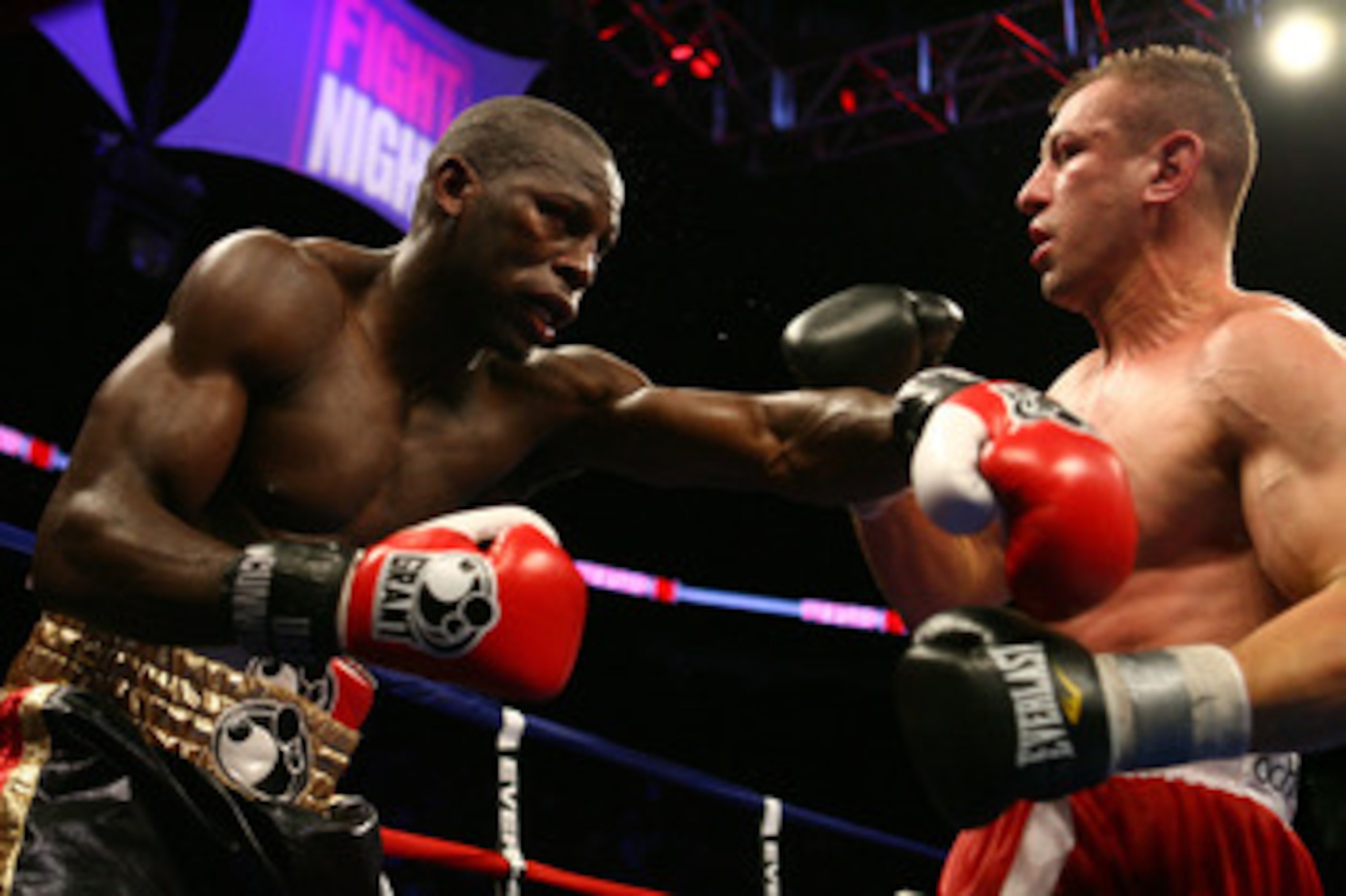 NEWARK, NJ - DECEMBER 11:  Steve Cunningham punches Tomasz Adamek during their IBF Cruiserweight Championship fight on December 11, 2008 at The Prudential Center in Newark, New Jersey.  Tomasz won a split decision.  (Photo by Al Bello/Getty Images)