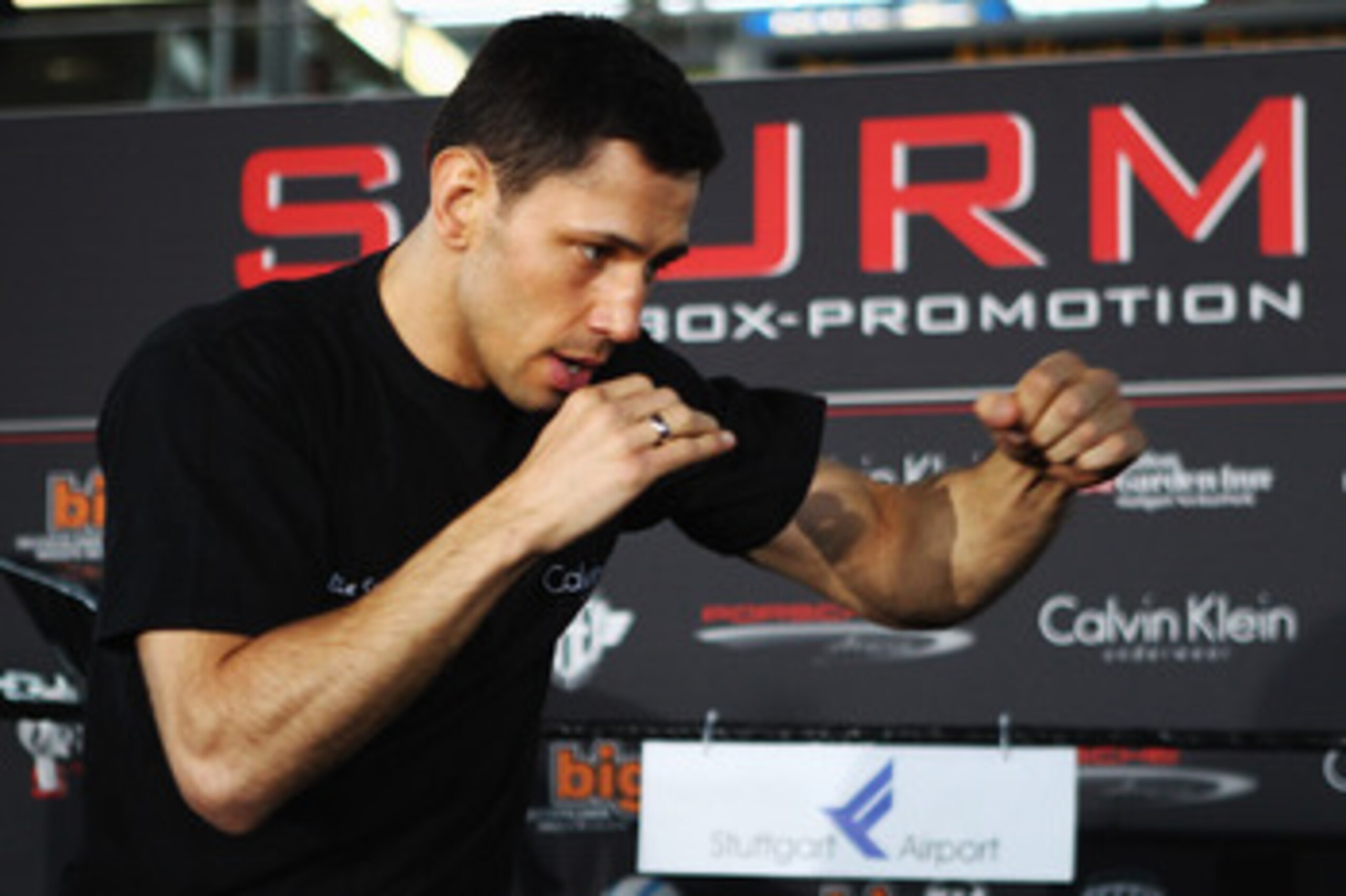 STUTTGART, GERMANY - FEBRUARY 16:  German boxer Felix Sturm boxes during a public training session at the airport on February 16, 2011 in Stuttgart, Germany. Sturm will defend his WBA middle weight title against Ronald Hearns of the U.S. on February 19, 2