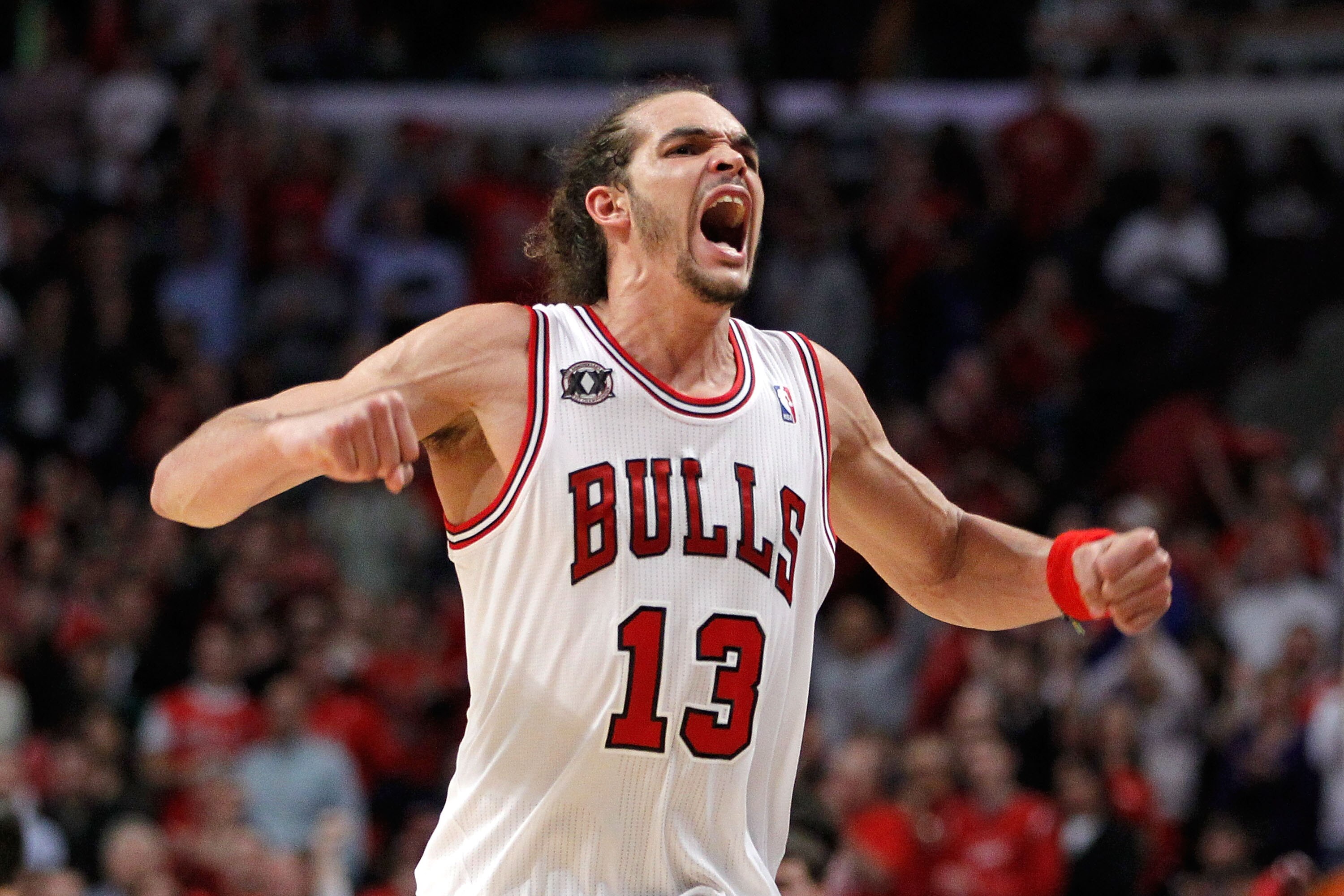 CHICAGO, IL - MAY 15:  Joakim Noah #13 of the Chicago Bulls reacts against the Miami Heat in Game One of the Eastern Conference Finals during the 2011 NBA Playoffs on May 15, 2011 at the United Center in Chicago, Illinois. NOTE TO USER: User expressly ack