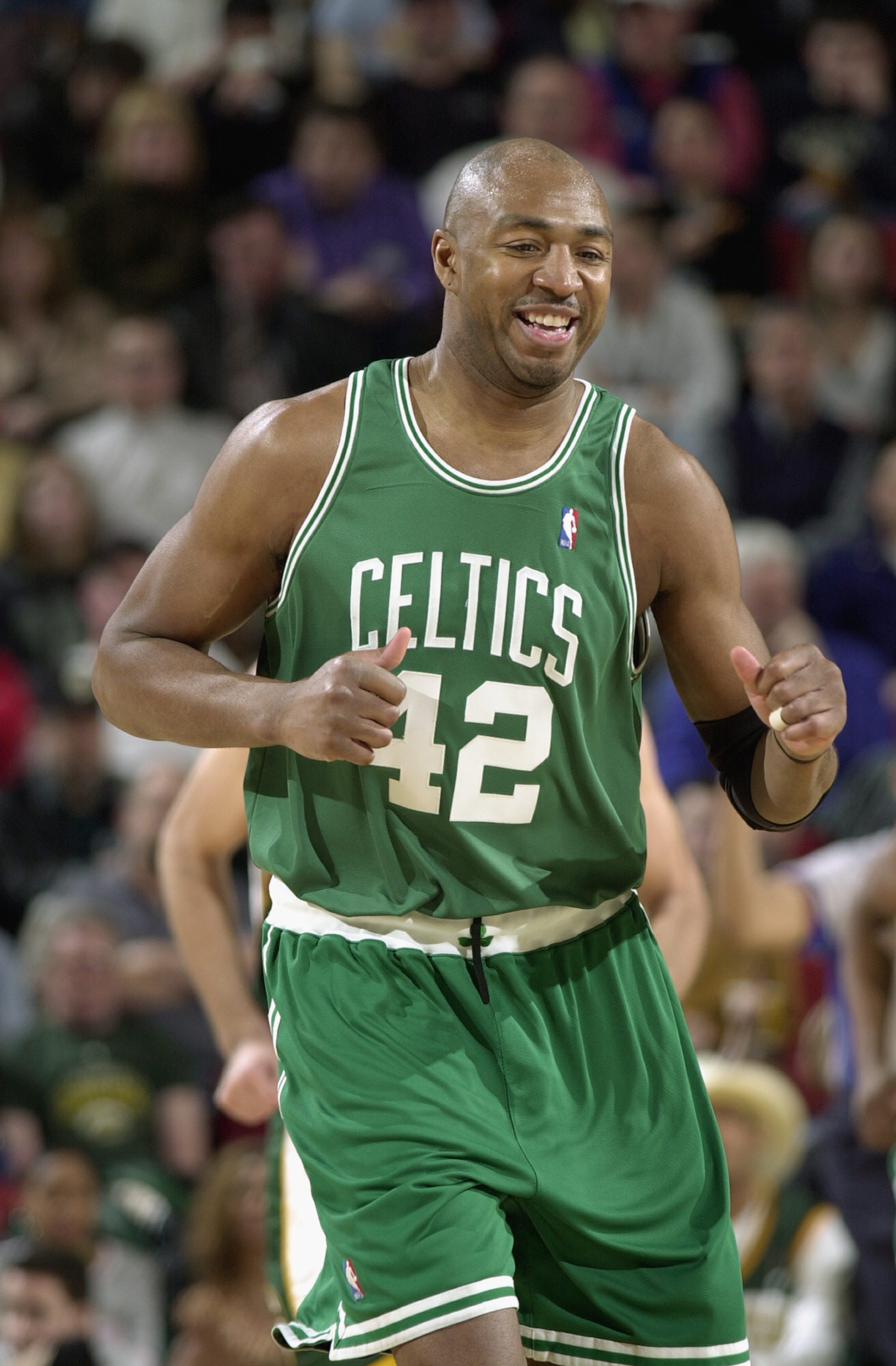 SEATTLE - FEBRUARY 11:  Vin Baker #42 of the Boston Celtics laughs during the game against the Seattle Sonics at Key Arena on February 11, 2003 in Seattle, Washington.  The Celtics won 82-76.  NOTE TO USER: User expressly acknowledges and agrees that, by
