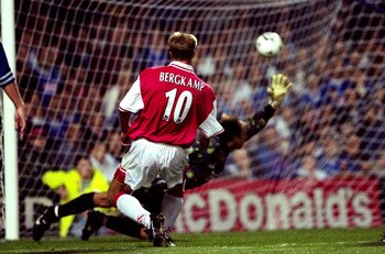 27 Aug 1997:  Dennis Bergkamp of Arsenal beats Kasey Keller in the Leicester City goal to score the late equaliser in the FA Carling Premiership match at Filbert Street in Leicester, England. The game ended 3-3. \ Mandatory Credit: Mark Thompson /Allsport