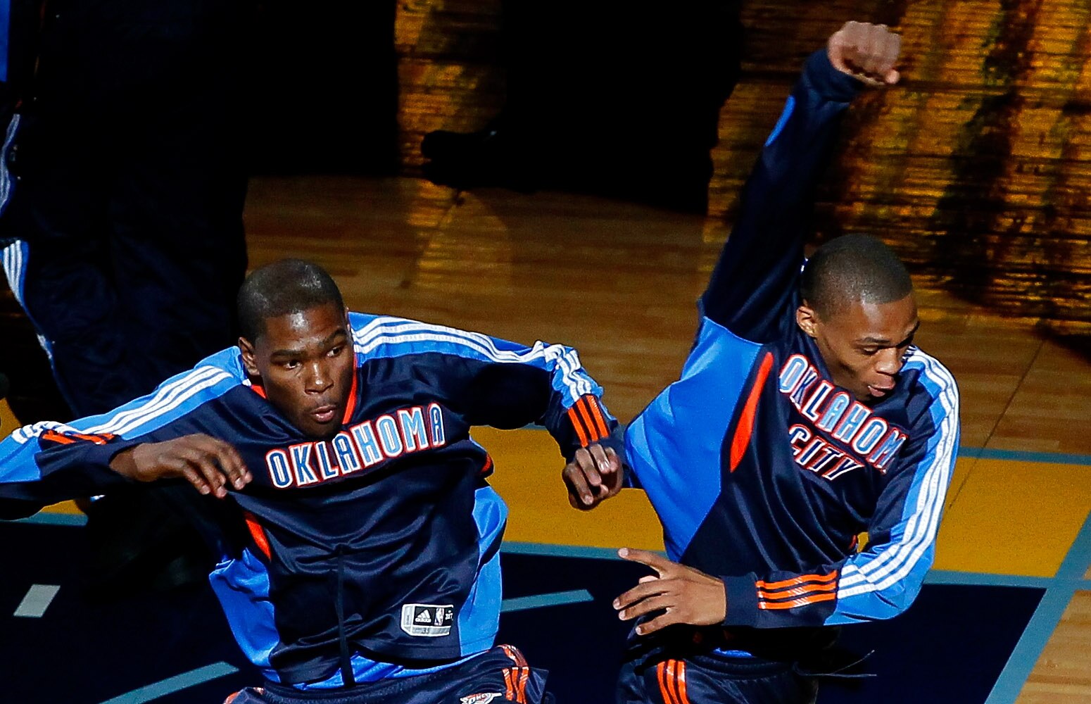 MEMPHIS, TN - MAY 13:  Kevin Durant #35 and Russell Westbrook #0 of the Oklahoma City Thunder leap around during introductions before facing the Memphis Grizzlies in Game Six of the Western Conference Semifinals in the 2011 NBA Playoffs at FedExForum on M