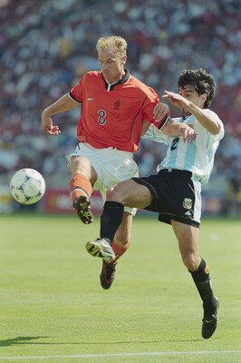 4 Jul 1998:  Dennis Bergkamp of Holland goes past Roberto Ayala of Argentina during the World Cup quarter-final match at the Stade Velodrome in Marseille, France. Bergkamp scored a late winner as Holland won 2-1. \ Mandatory Credit: Ben Radford /Allsport