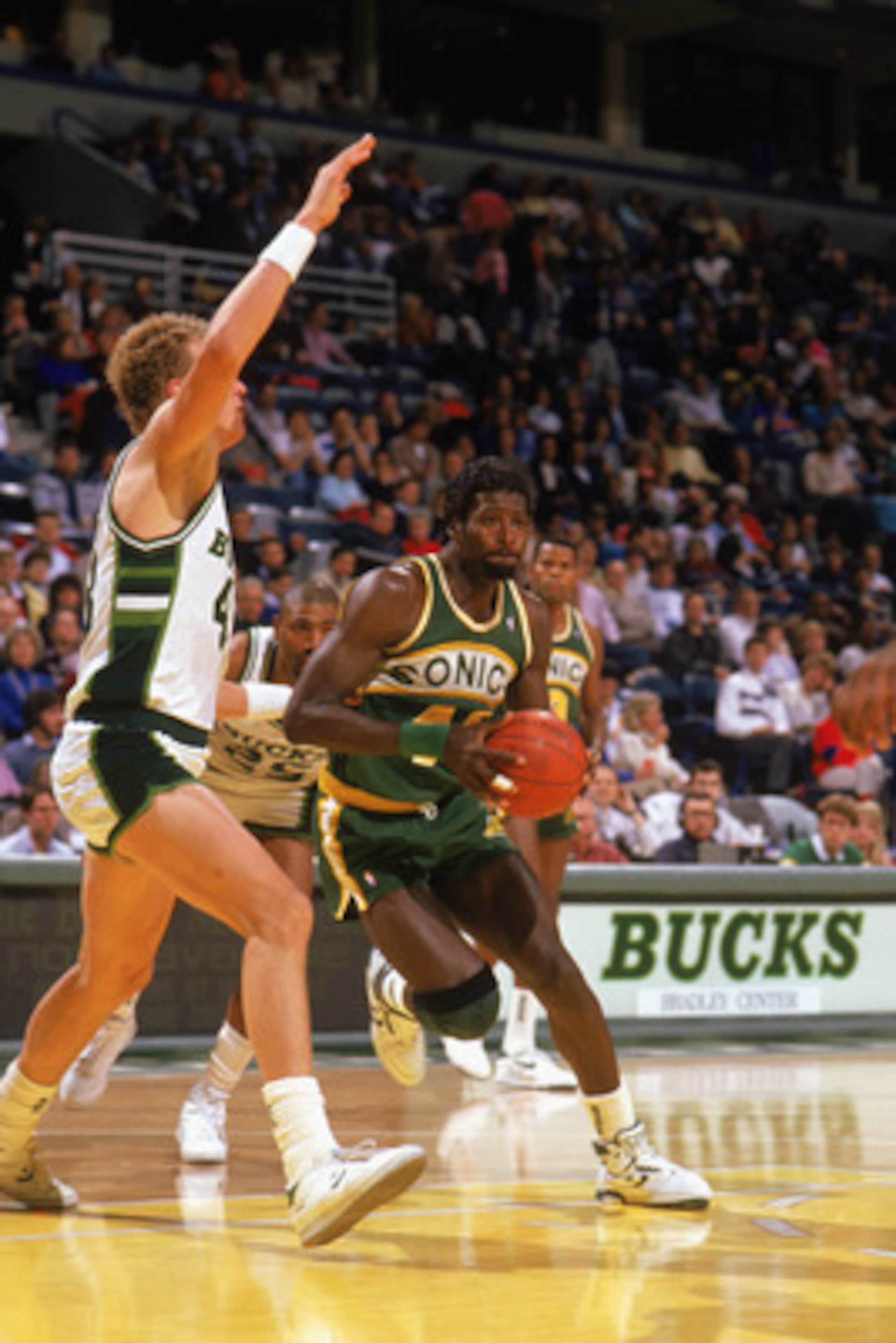 MILWAUKEE - 1988: Michael Cage #44 of the Seattle Supersonics drives to the basket against Jack Sikma #43 of the Milwaukee Bucks during the 1988-1989 NBA season game at The Bradley Center in Milwaukee, Wisconsin. (Photo by Jonathan Daniel/Getty Images) MILWAUKEE - 1988: Michael Cage #44 of the Seattle Supersonics drives to the basket against Jack Sikma #43 of the Milwaukee Bucks during the 1988-1989 NBA season game at The Bradley Center in Milwaukee, Wisconsin. (Photo by Jonathan Daniel/Getty Images)