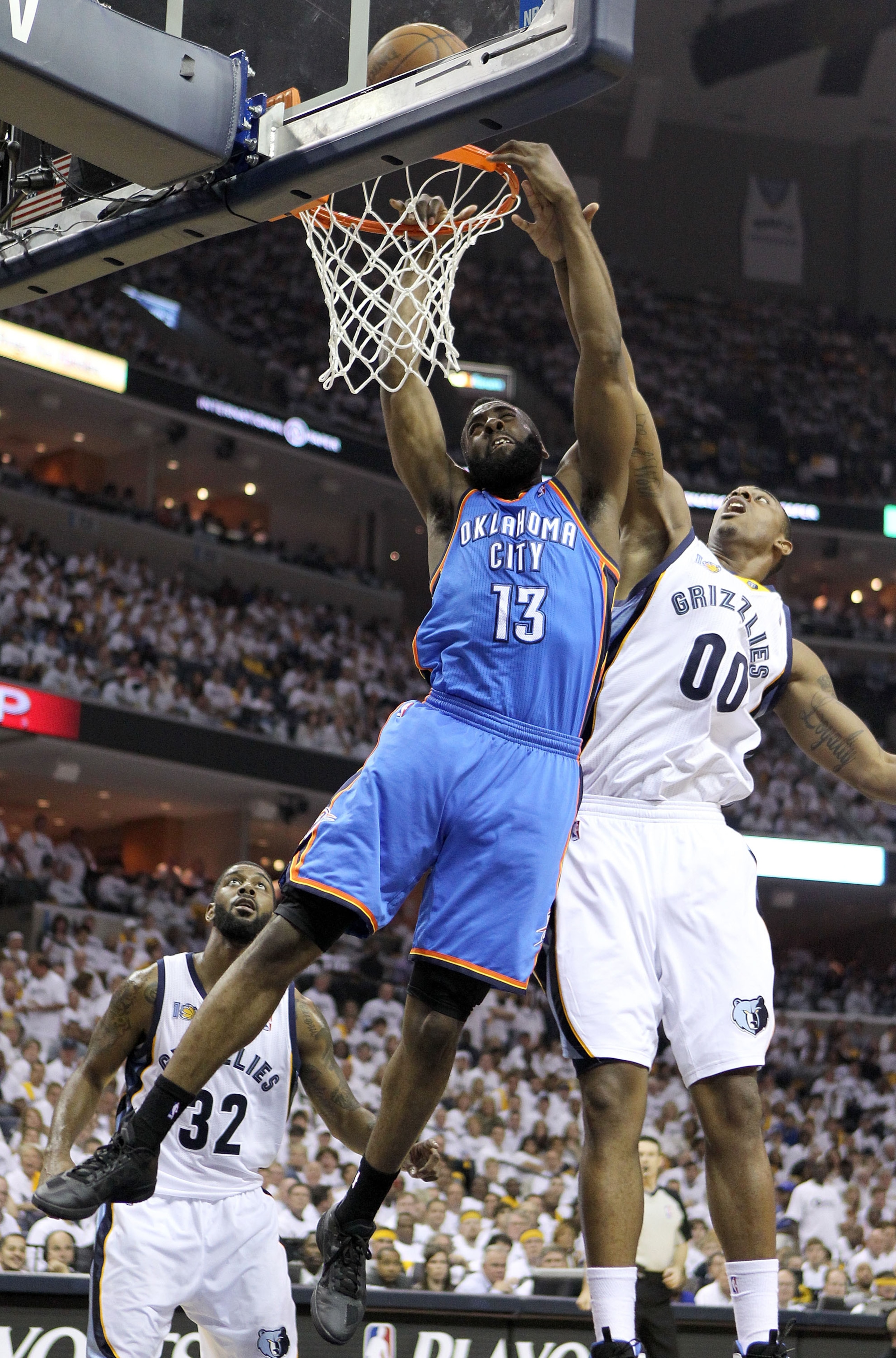 MEMPHIS, TN - MAY 07:  James Harden #13 of the Oklahoma City Thunder shoots the ball while defended by Darrell Arthur #00 of the Memphis Grizzlies in Game Three of the Western Conference Semifinals in the 2011 NBA Playoffs at FedExForum on May 7, 2011 in