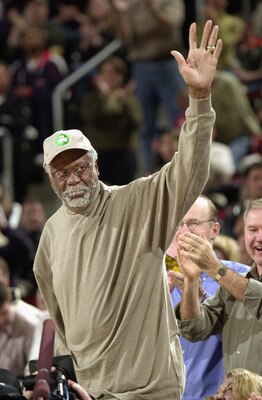 SEATTLE - FEBRUARY 11:  Former Celtic great Bill Russell waves during the game between the Boston Celtics and the Seattle Sonics at Key Arena on February 11, 2003 in Seattle, Washington.  The Celtics won 82-76.  NOTE TO USER: User expressly acknowledges a