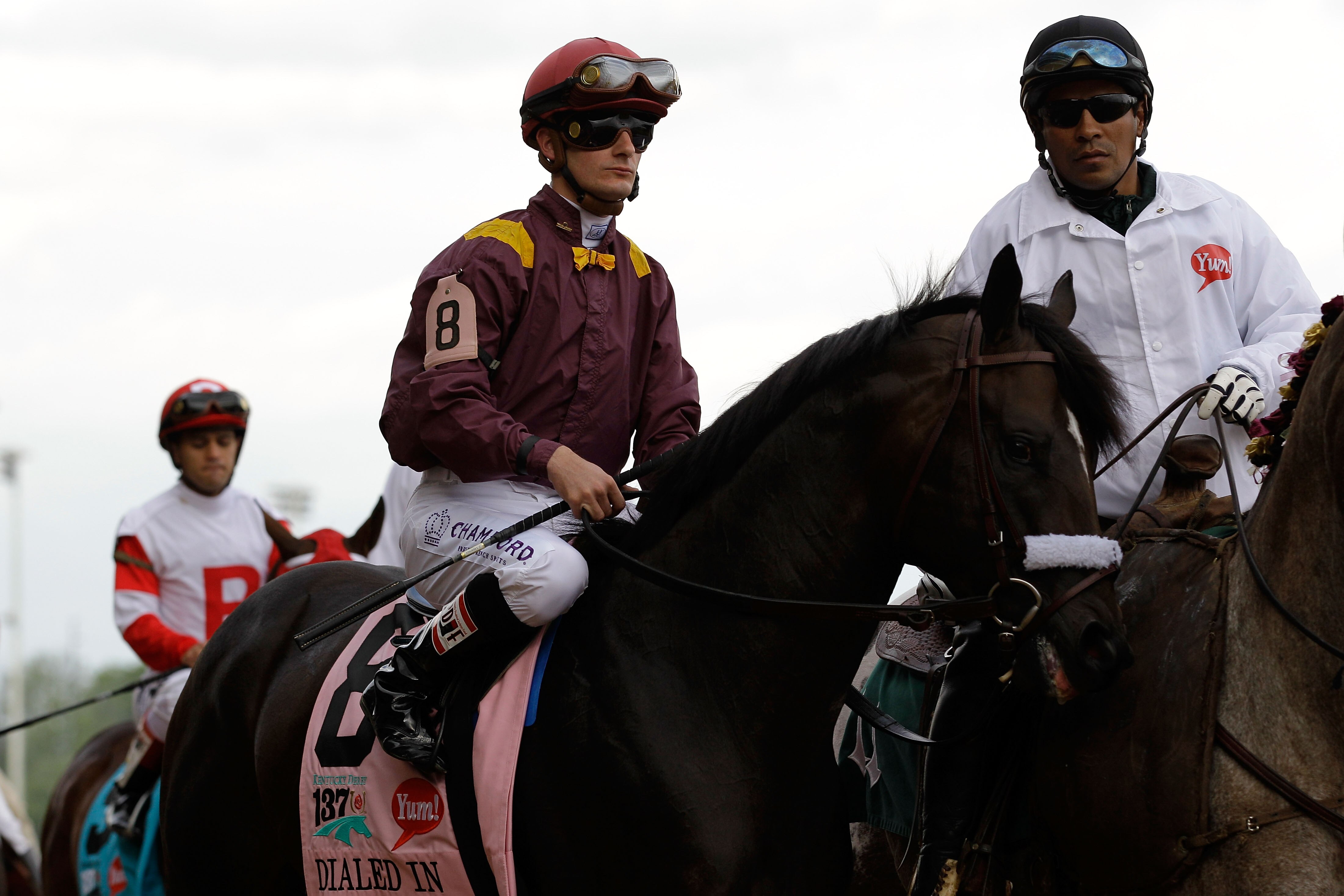LOUISVILLE, KY - MAY 07:  Jockey Julien R. Leparoux, riding Dialed In #8, is escourted onto the track for the running of the 137th Kentucky Derby at Churchill Downs on May 7, 2011 in Louisville, Kentucky.  (Photo by Rob Carr/Getty Images)
