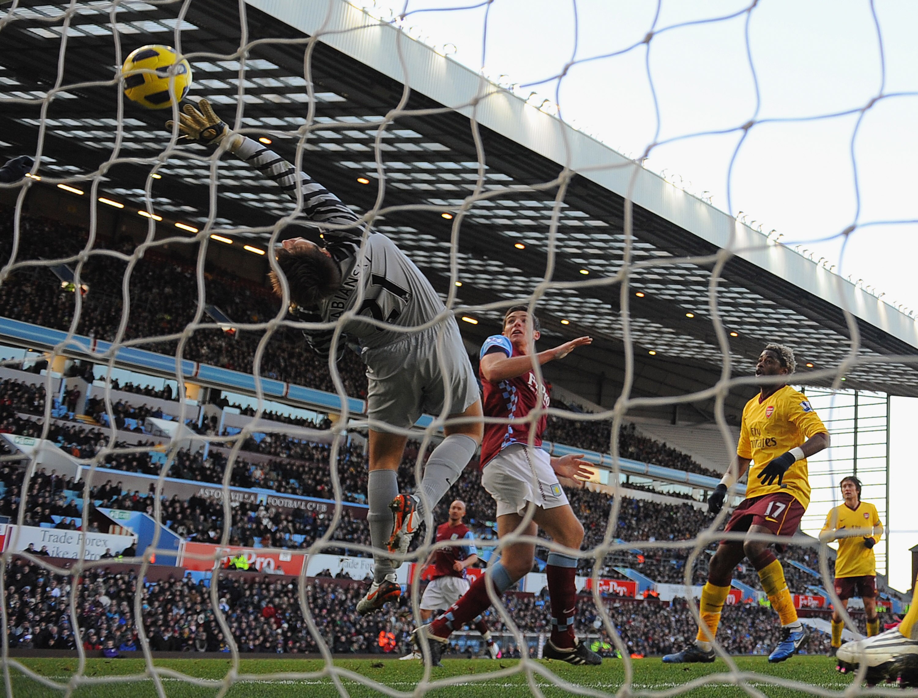 BIRMINGHAM, ENGLAND - NOVEMBER 27: Ciaran Clark of Villa beats Lukasz Fabianski of Arsenal to score to make it 3-2 during the Barclays Premier League match between Aston Villa and Arsenal at Villa Park on November 27, 2010 in Birmingham, England. (Photo BIRMINGHAM, ENGLAND - NOVEMBER 27: Ciaran Clark of Villa beats Lukasz Fabianski of Arsenal to score to make it 3-2 during the Barclays Premier League match between Aston Villa and Arsenal at Villa Park on November 27, 2010 in Birmingham, England. (Photo