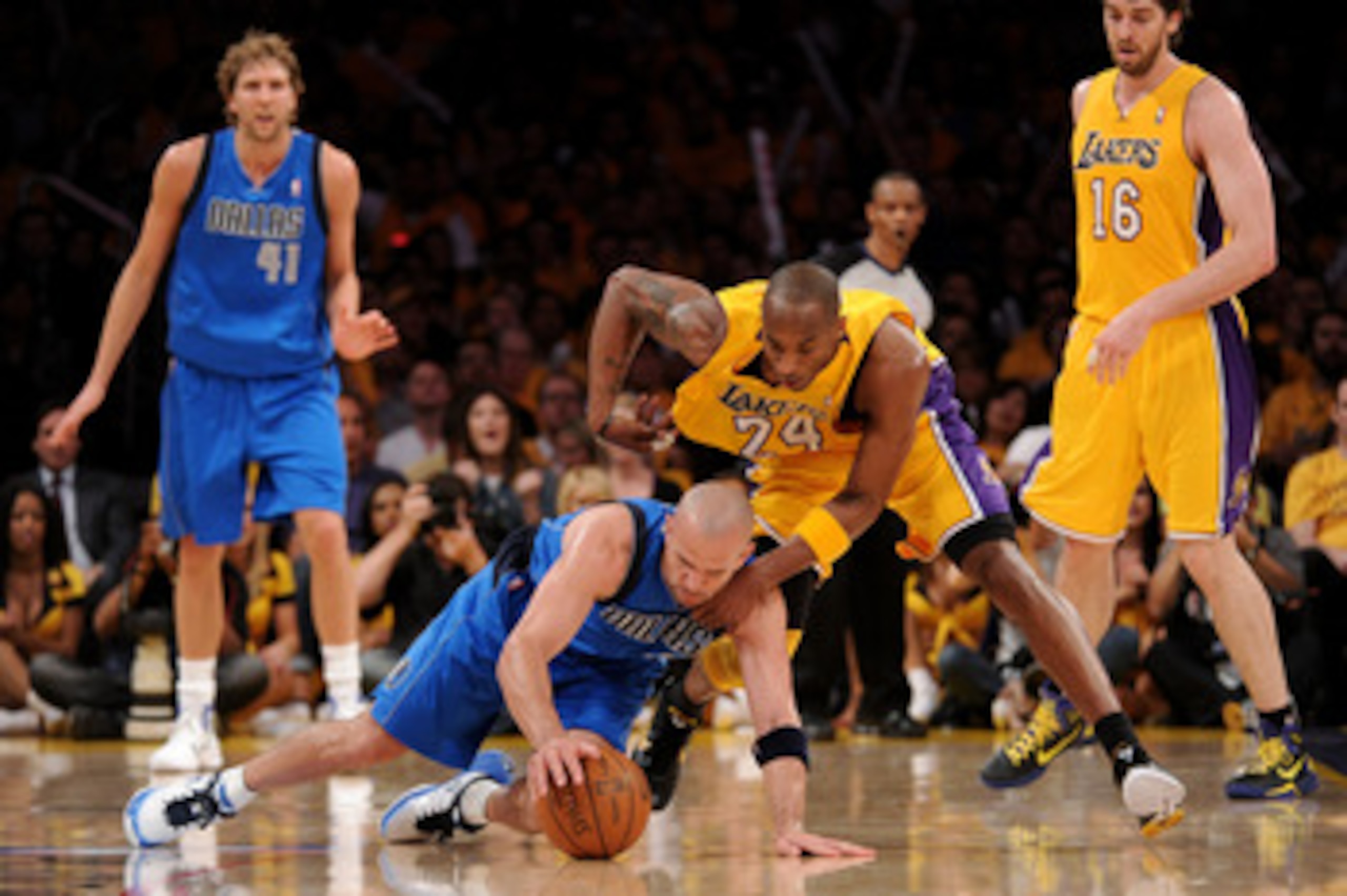 LOS ANGELES, CA - MAY 02:  Jason Kidd #2 of the Dallas Mavericks and Kobe Bryant #24 of the Los Angeles Lakers battle for a loose ball in the third quarter in Game One of the Western Conference Semifinals in the 2011 NBA Playoffs at Staples Center on May