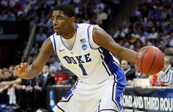 CHARLOTTE, NC - MARCH 20:  Kyrie Irving #1 of the Duke Blue Devils moves the ball while taking on the Michigan Wolverines during the third round of the 2011 NCAA men's basketball tournament at Time Warner Cable Arena on March 20, 2011 in Charlotte, North