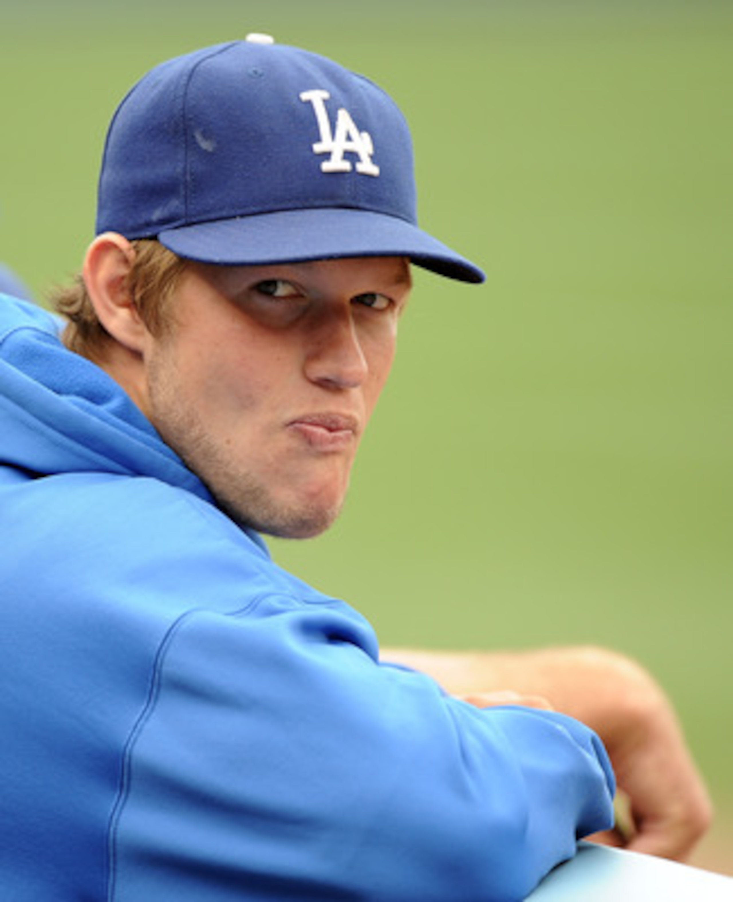 LOS ANGELES, CA - MAY 14:  Clayton Kershaw #22 of the Los Angeles Dodgers watches play from the dugout against the Arizona Diamondbacks at Dodger Stadium on May 14, 2011 in Los Angeles, California.  (Photo by Harry How/Getty Images)