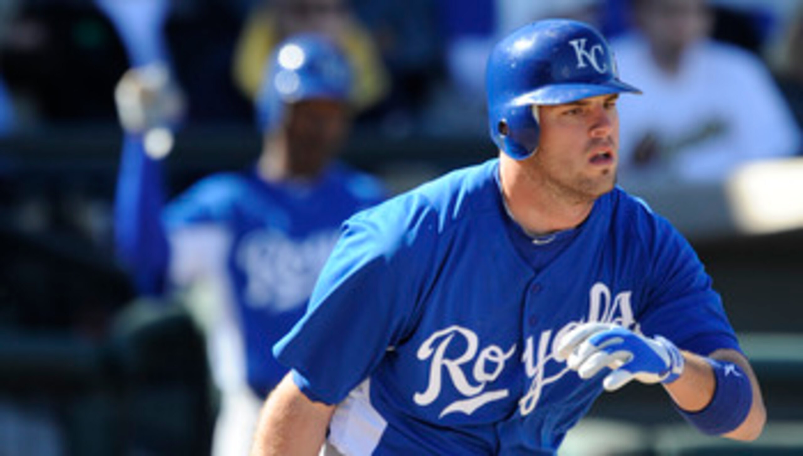 SURPISE, AZ - FEBRUARY 27: Mike Moustakas #8 of the Kansas City Royals bats during a spring training game against the Texas Rangers at Surprise Stadium on February 27, 2011 in Surprise, Arizona. (Photo by Rob Tringali/Getty Images)