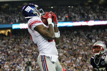 GLENDALE, AZ - FEBRUARY 03: Wide receiver Plaxico Burress #17 of the New York Giants catches a 13-yard touchdown pass in the fourth quarter over Ellis Hobbs #27 of the New England Patriots during Super Bowl XLII on February 3, 2008 at the University of P GLENDALE, AZ - FEBRUARY 03: Wide receiver Plaxico Burress #17 of the New York Giants catches a 13-yard touchdown pass in the fourth quarter over Ellis Hobbs #27 of the New England Patriots during Super Bowl XLII on February 3, 2008 at the University of P
