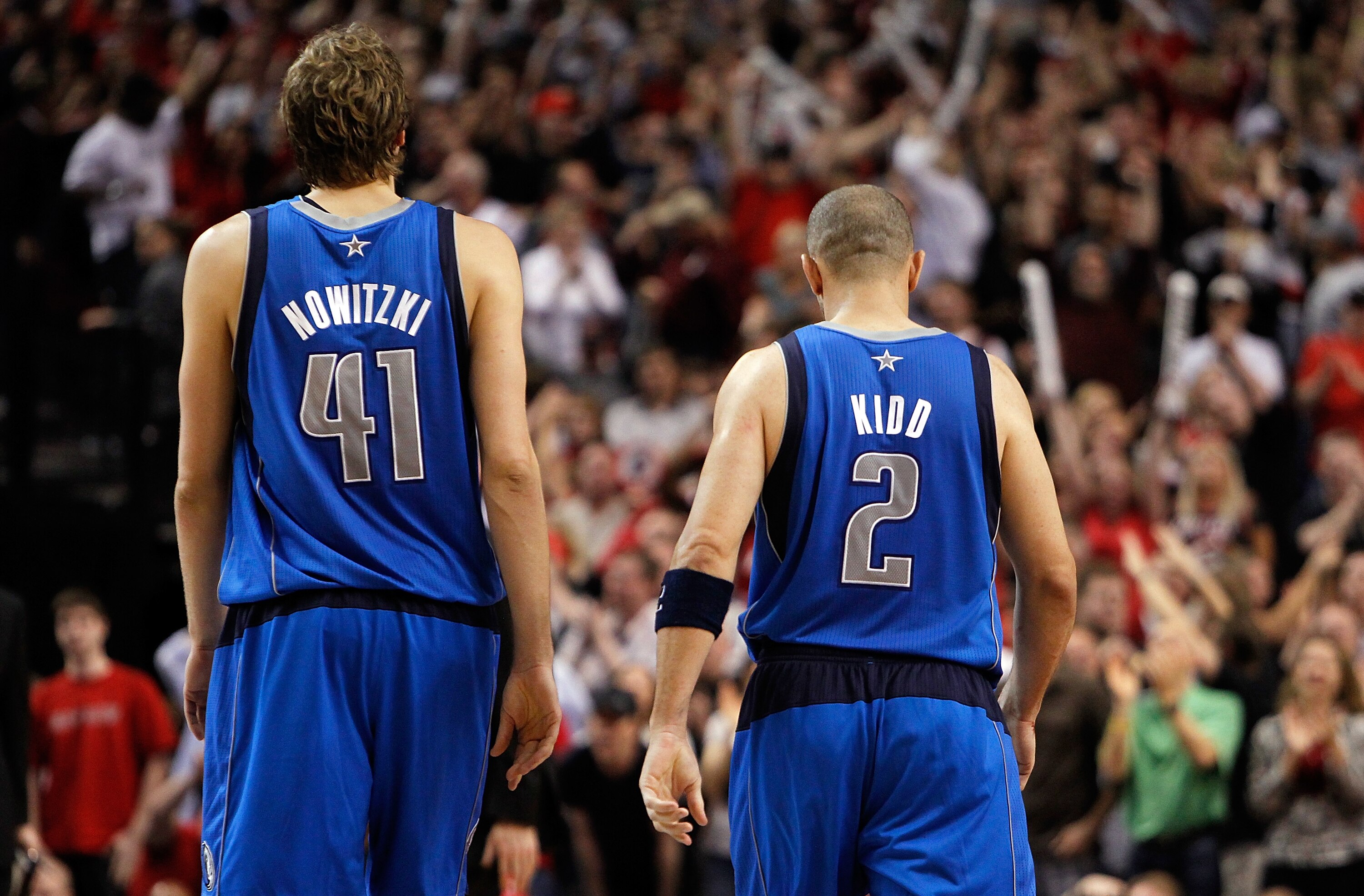 PORTLAND, OR - APRIL 23:   Dirk Nowitzki #41 and Jason Kidd #2 of the Dallas Mavericks walks off the floor against the Portland Trail Blazers in Game Four of the Western Conference Quarterfinals in the 2011 NBA Playoffs on April 23, 2011 at the Rose Garde