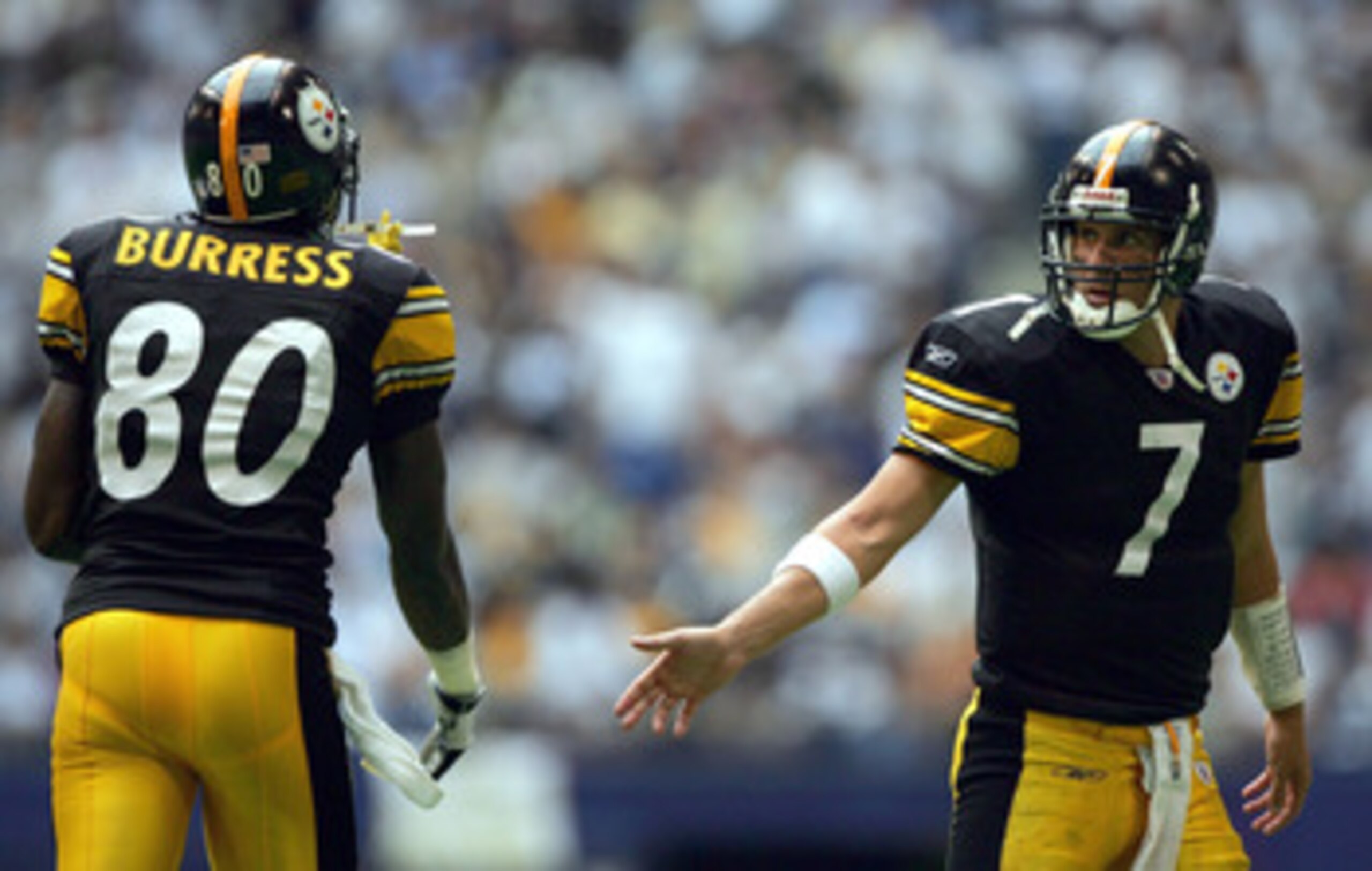 IRVING, TEXAS - OCTOBER 17:  Ben Roethlisberger #7 of the Pittsburgh Steelers celebrates a Jerame Tuman #84 touchdown with Plaxico Burress #80 in the fourth quarter at Texas Stadium on October 17, 2004 in Irving, Texas. The Steelers won 24-20.  (Photo by