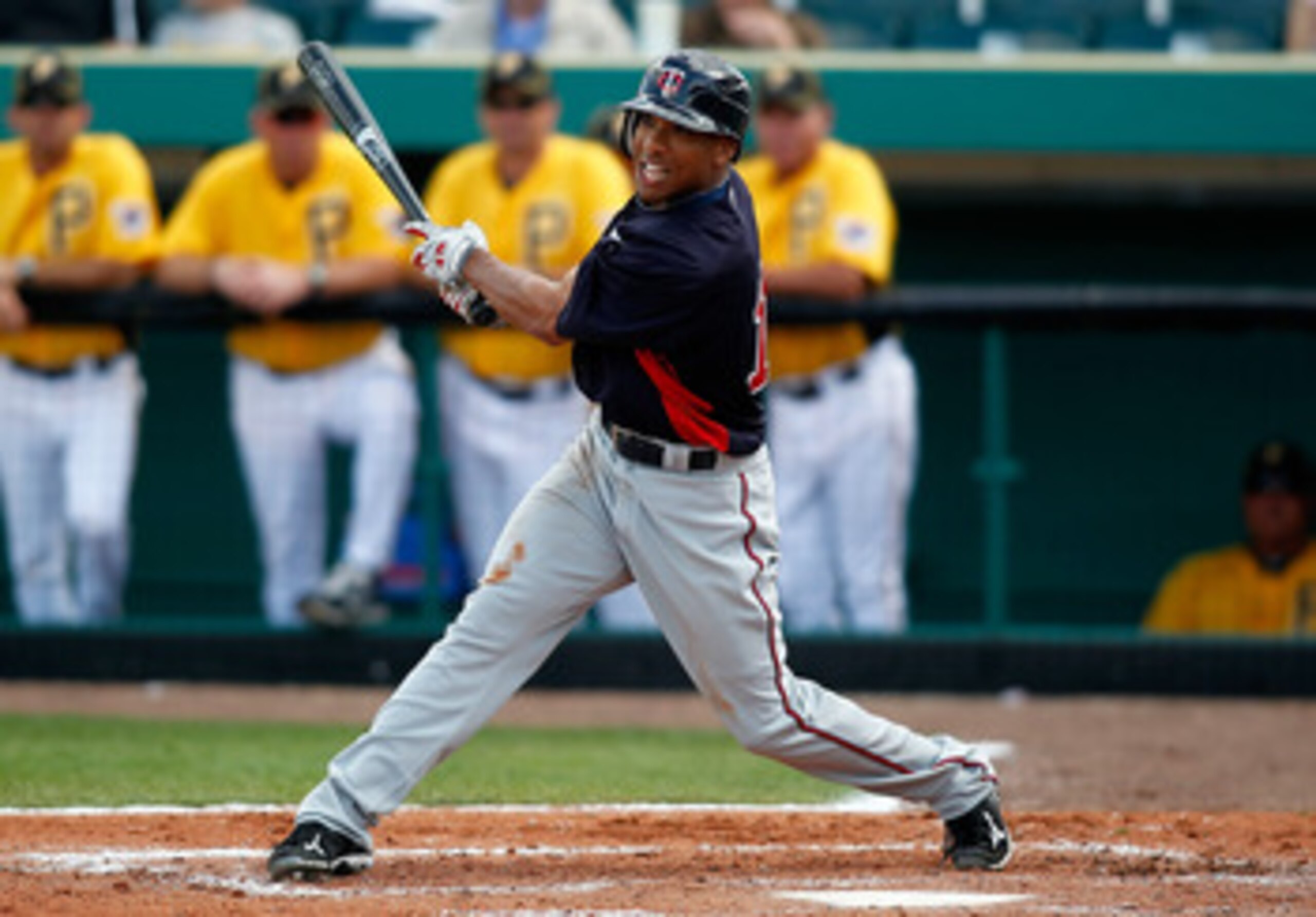 BRADENTON, FL - MARCH 02:  Outfielder Ben Revere #11 of the Minnesota Twins fouls off a pitch against the Pittsburgh Pirates during a Grapefruit League Spring Training Game at McKechnie Field on March 2, 2011 in Bradenton, Florida.  (Photo by J. Meric/Get