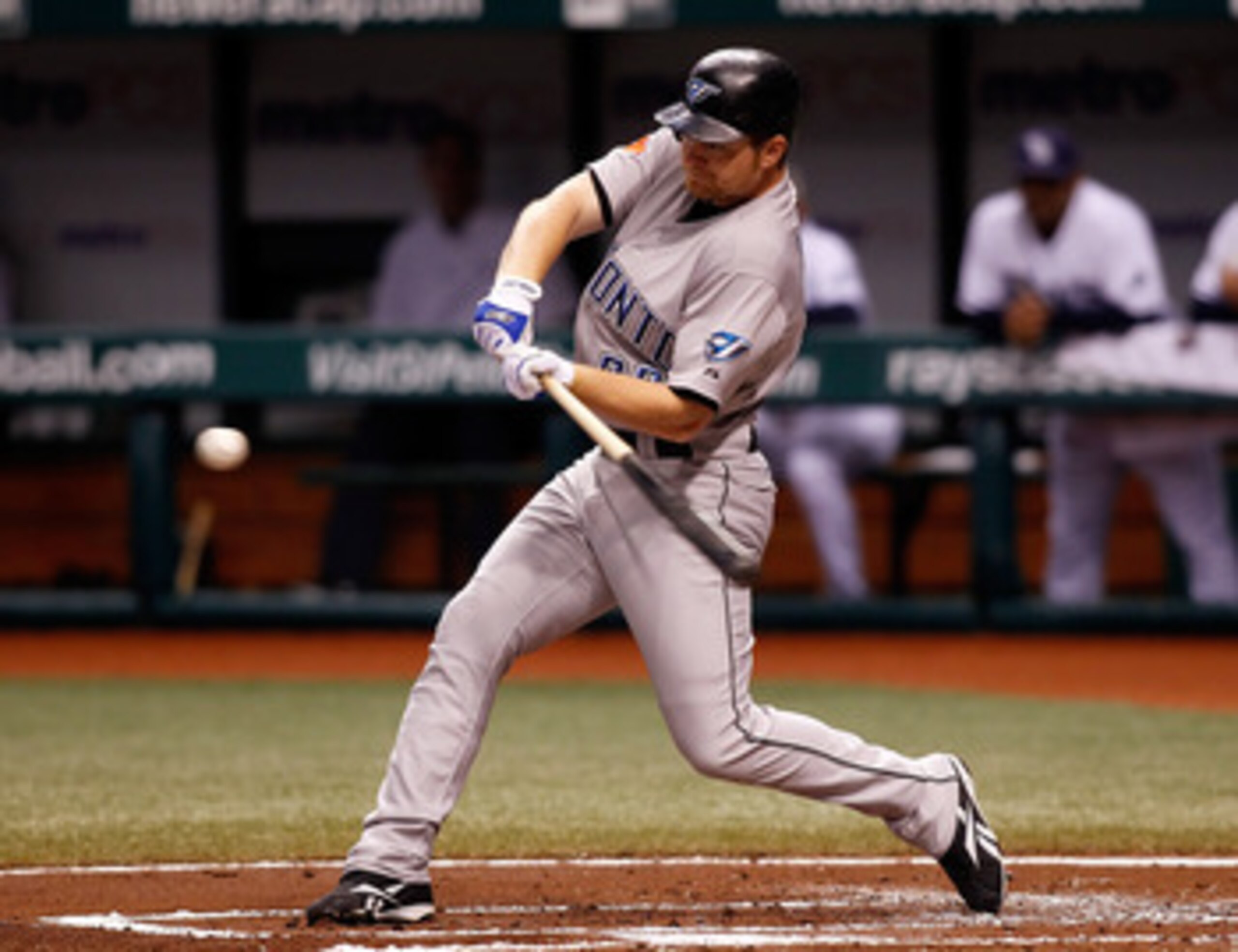 ST PETERSBURG, FL - AUGUST 31: Infielder Adam Lind #26 of the Toronto Blue Jays fouls off a pitch against the Tampa Bay Rays during the game at Tropicana Field on August 31, 2010 in St. Petersburg, Florida. (Photo by J. Meric/Getty Images) ST PETERSBURG, FL - AUGUST 31: Infielder Adam Lind #26 of the Toronto Blue Jays fouls off a pitch against the Tampa Bay Rays during the game at Tropicana Field on August 31, 2010 in St. Petersburg, Florida. (Photo by J. Meric/Getty Images)