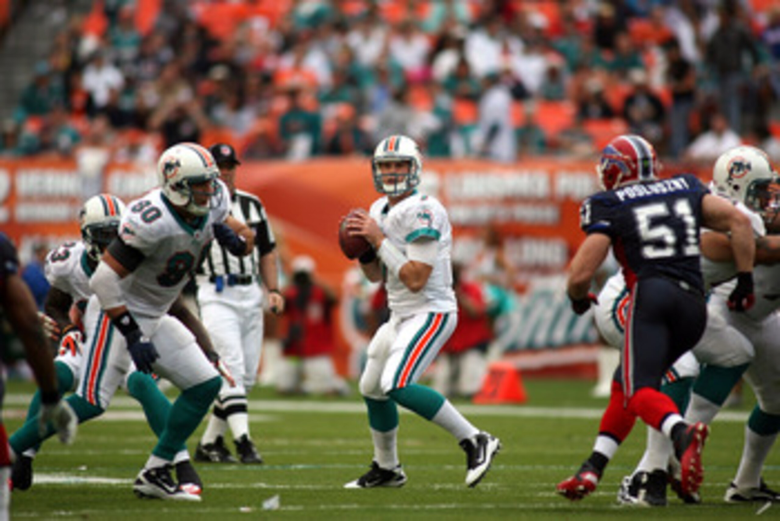 MIAMI - DECEMBER 19:  Quarterback Chad Henne #7 of the Miami Dolphins throws against the Buffalo Bills at Sun Life Stadium on December 19, 2010 in Miami, Florida. The Bills defeated the Dolphins 17-14.  (Photo by Marc Serota/Getty Images)