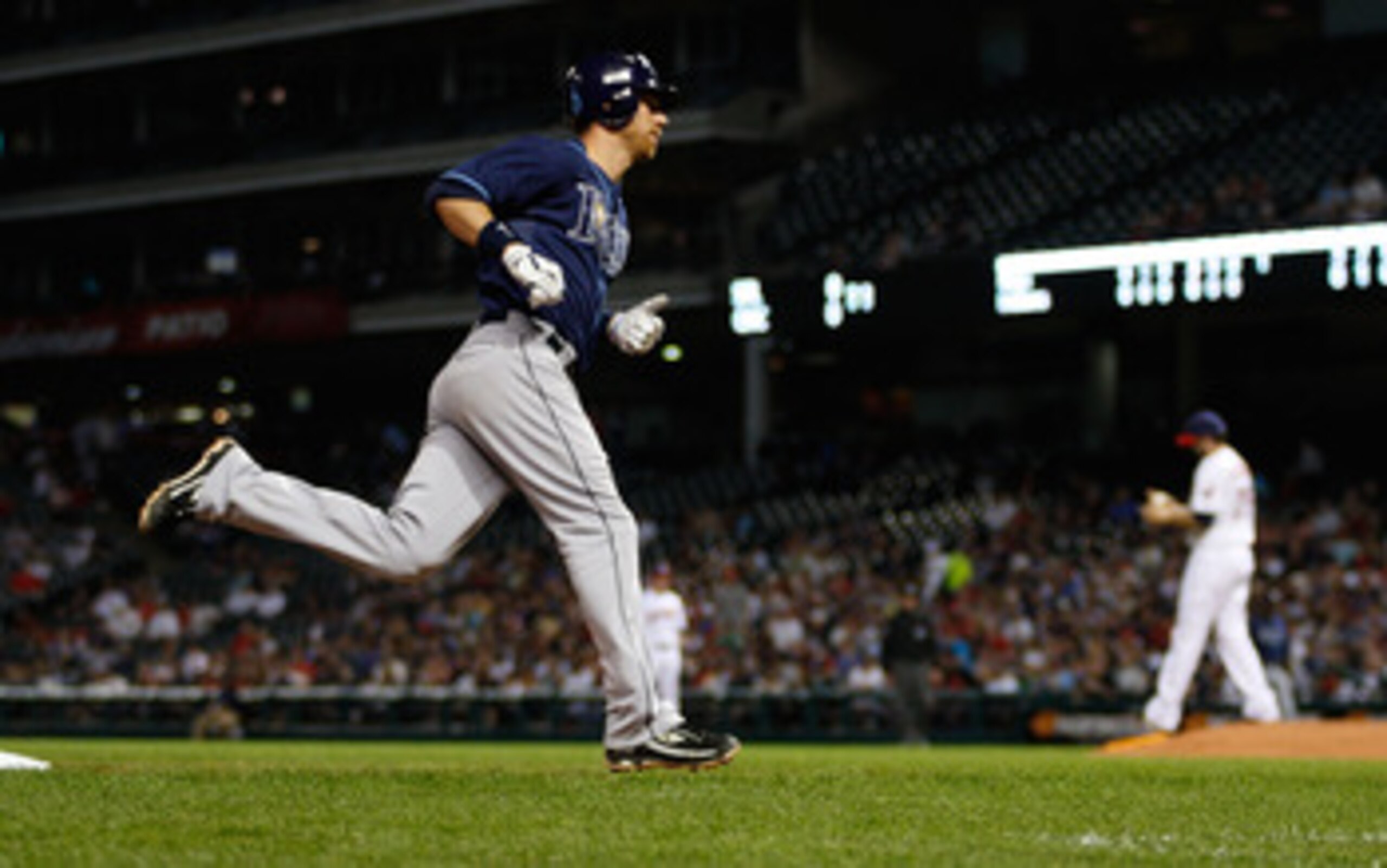 CLEVELAND - MAY 11: Ben Zobrist #18 of the Tampa Bay Rays trots around third base after hitting a home run off of Justin Germano #39 of the Cleveland Indians during the game on May 11, 2011 at Progressive Field in Cleveland, Ohio. (Photo by Jared Wickerh CLEVELAND - MAY 11: Ben Zobrist #18 of the Tampa Bay Rays trots around third base after hitting a home run off of Justin Germano #39 of the Cleveland Indians during the game on May 11, 2011 at Progressive Field in Cleveland, Ohio. (Photo by Jared Wickerh