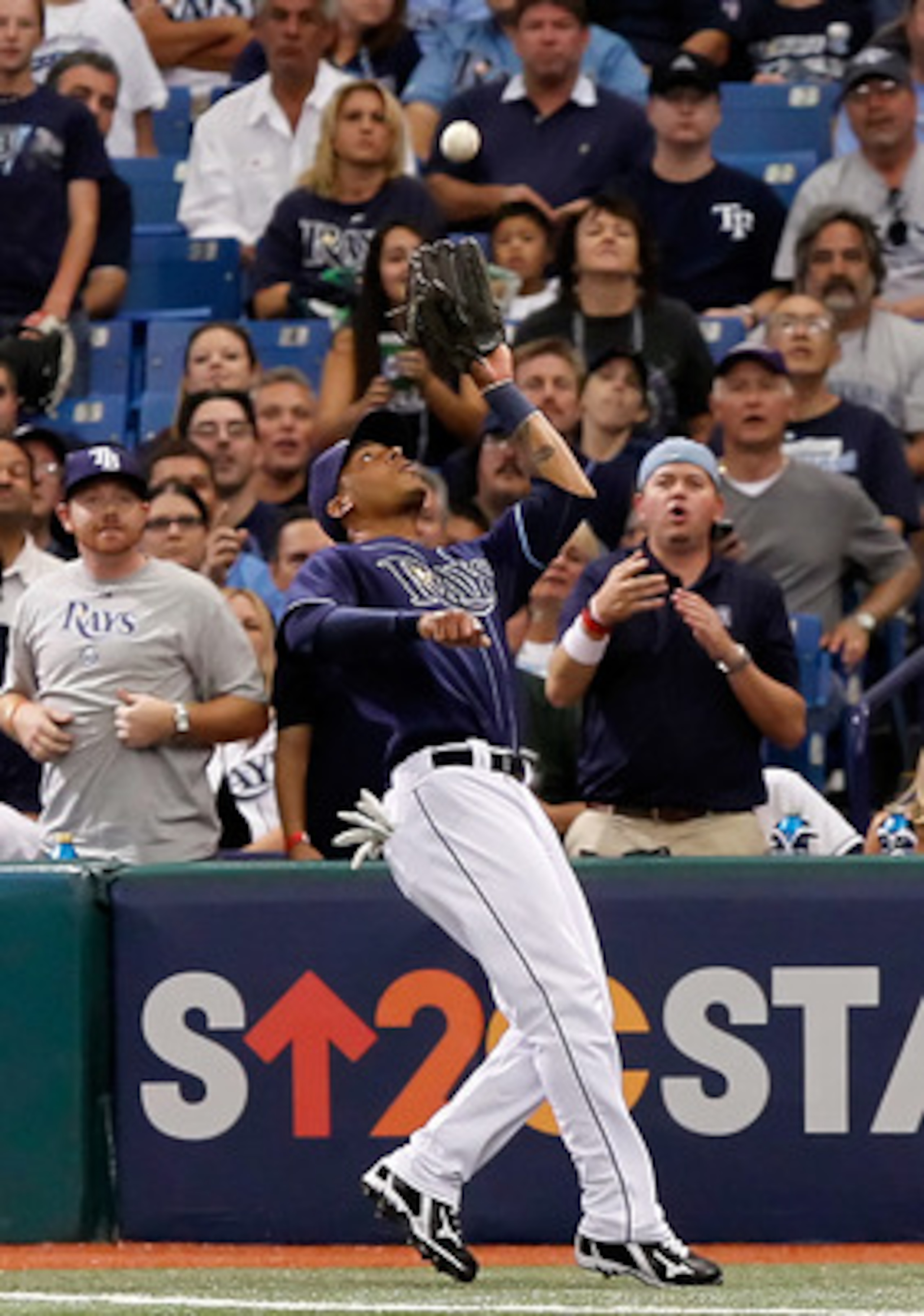 ST. PETERSBURG - OCTOBER 07:  Outfielder Desmond Jennings #27 of the Tampa Bay Rays catches a foul ball against the Texas Rangers during Game 2 of the ALDS at Tropicana Field on October 7, 2010 in St. Petersburg, Florida.  (Photo by J. Meric/Getty Images)