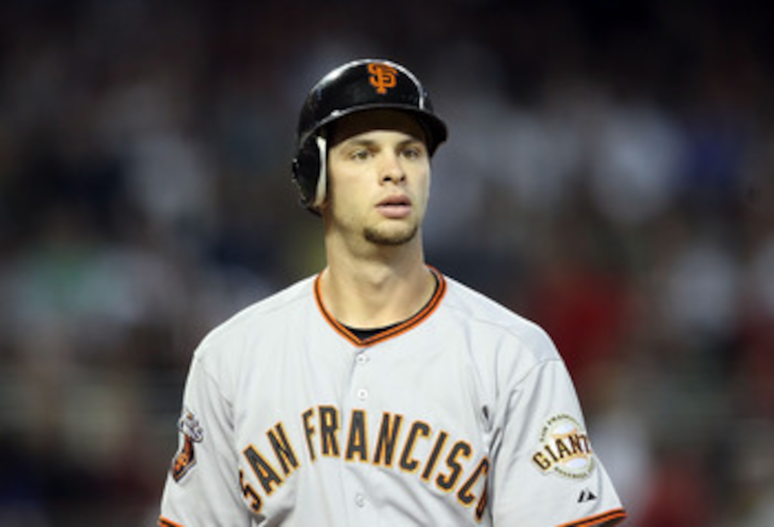 PHOENIX, AZ - APRIL 17:  Brandon Belt #9 of the San Francisco Giants at bat during the Major League Baseball game against the Arizona Diamondbacks at Chase Field on April 17, 2011 in Phoenix, Arizona. The Diamondbacks defeated the Giants 6-5 in the twelft